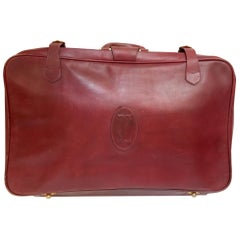Cartier Must de Cartier Valigia in pelle rosso borgogna con logo C Parigi 1975
