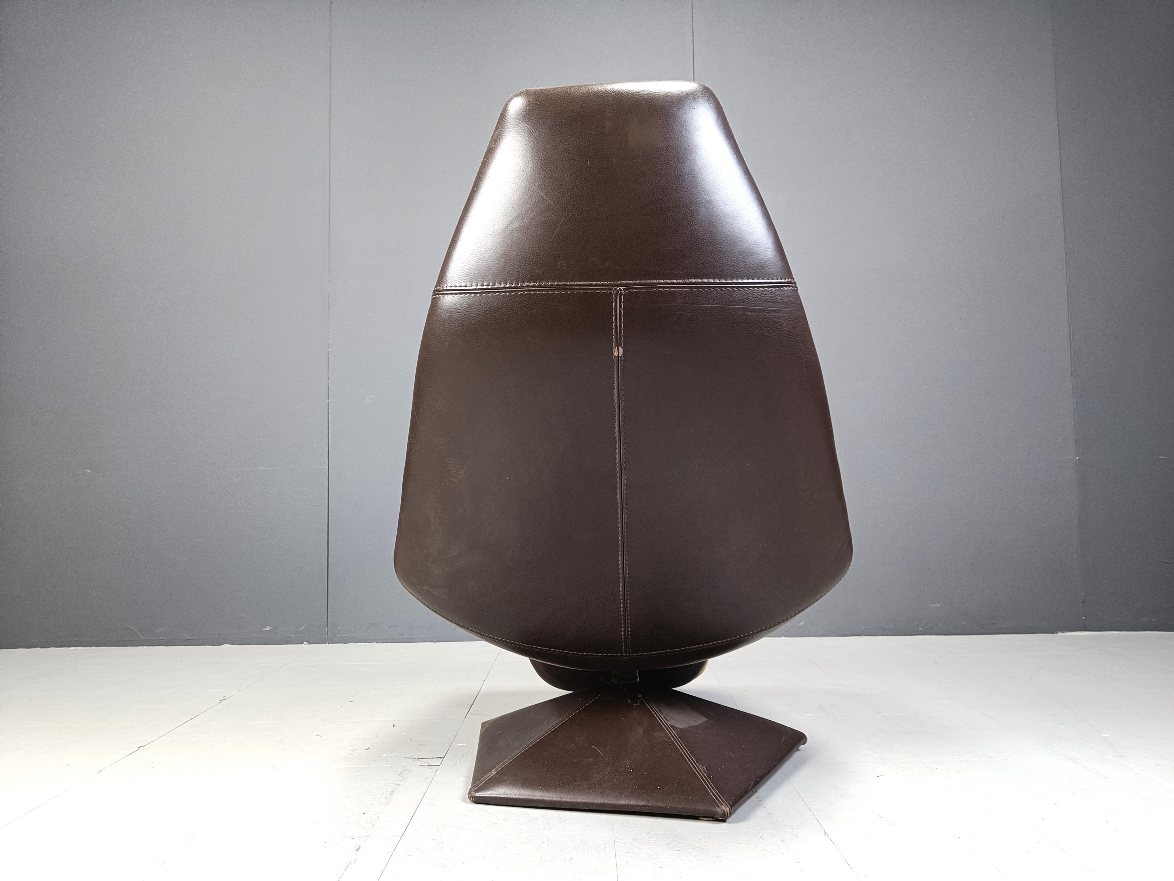 Vintage leather swivel chair with ottoman, 1970s For Sale 4
