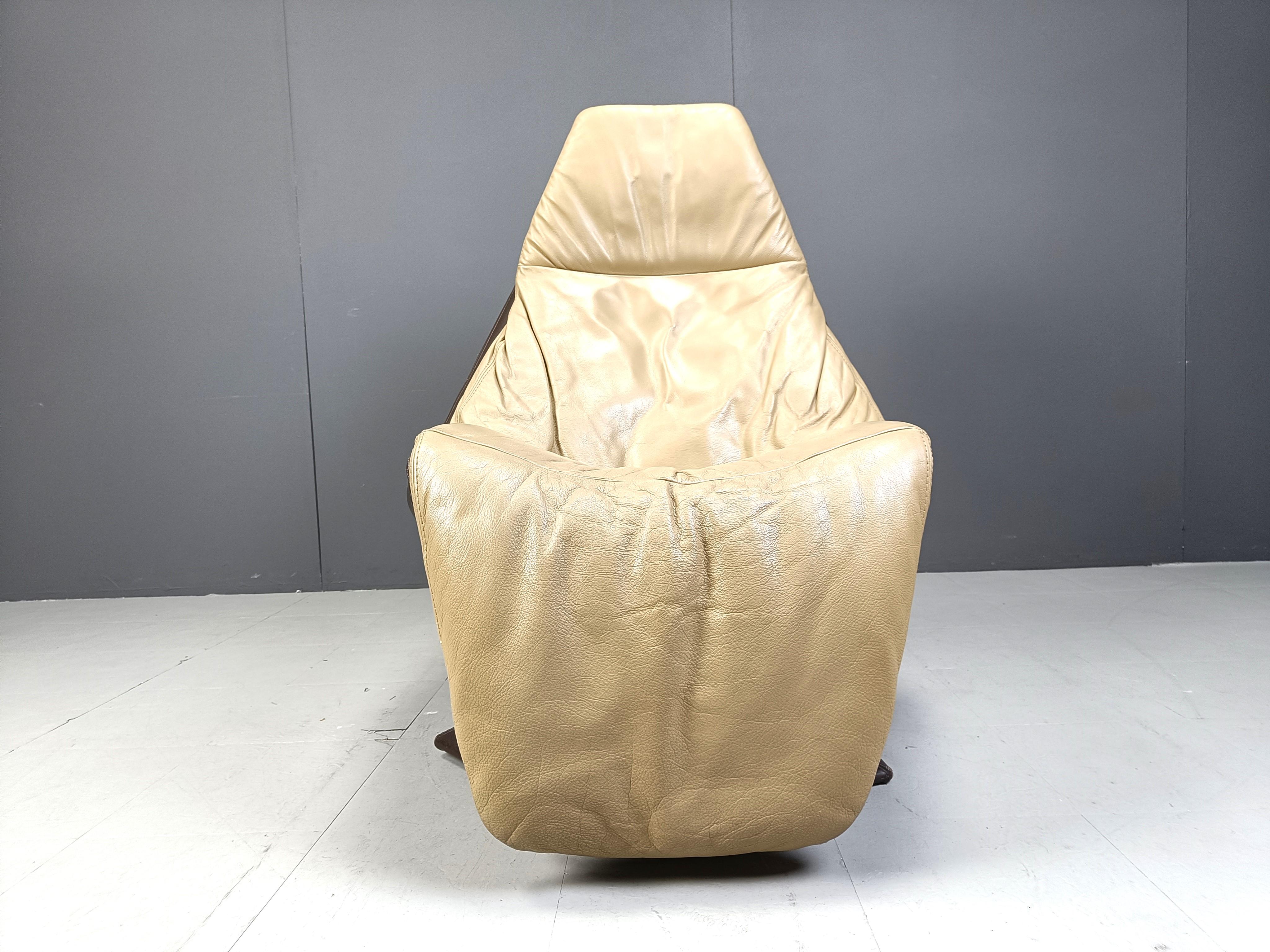 Vintage leather swivel chair with ottoman, 1970s For Sale 1