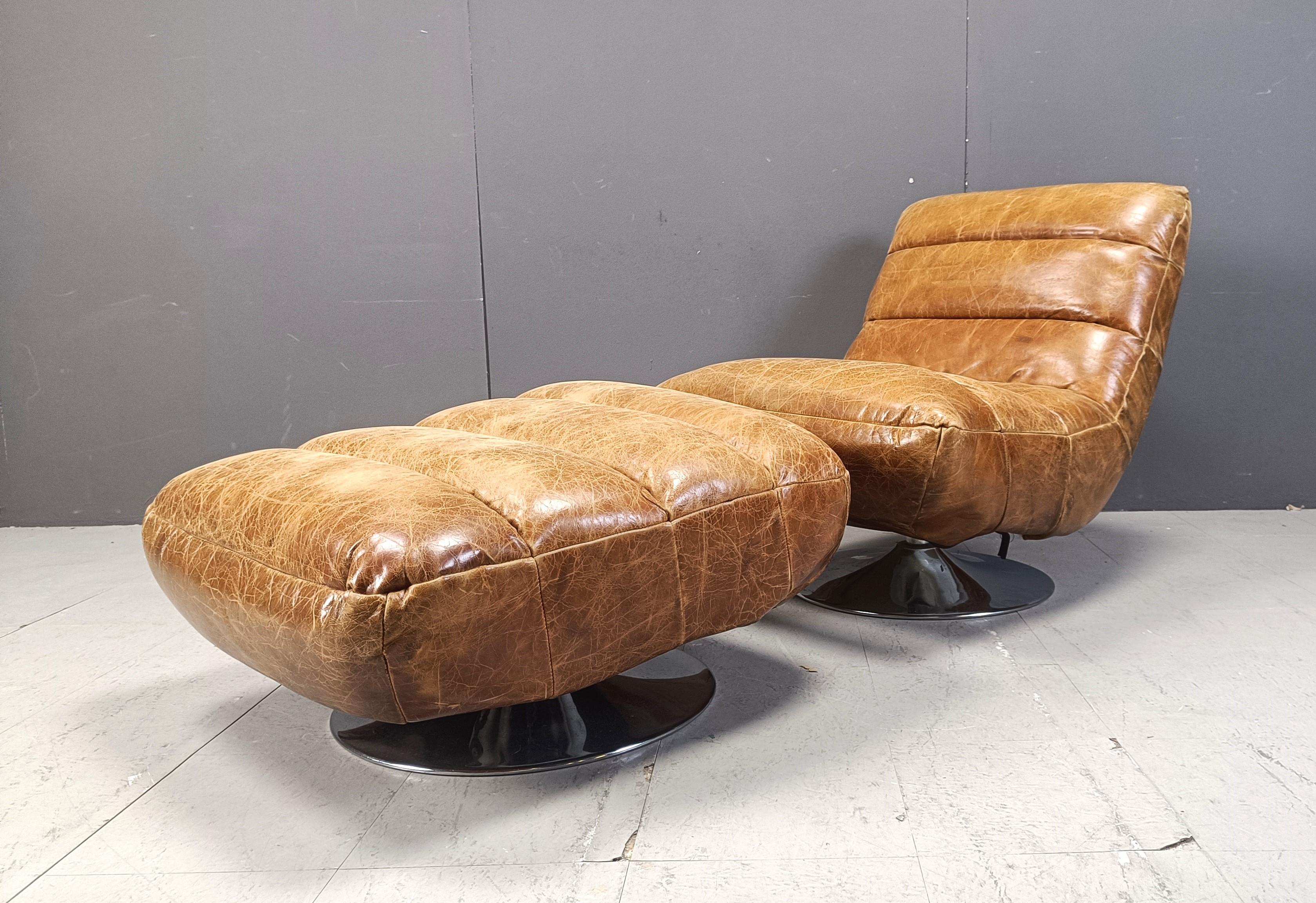 Late 20th Century Vintage leather swivel chair with stool, 1970s For Sale