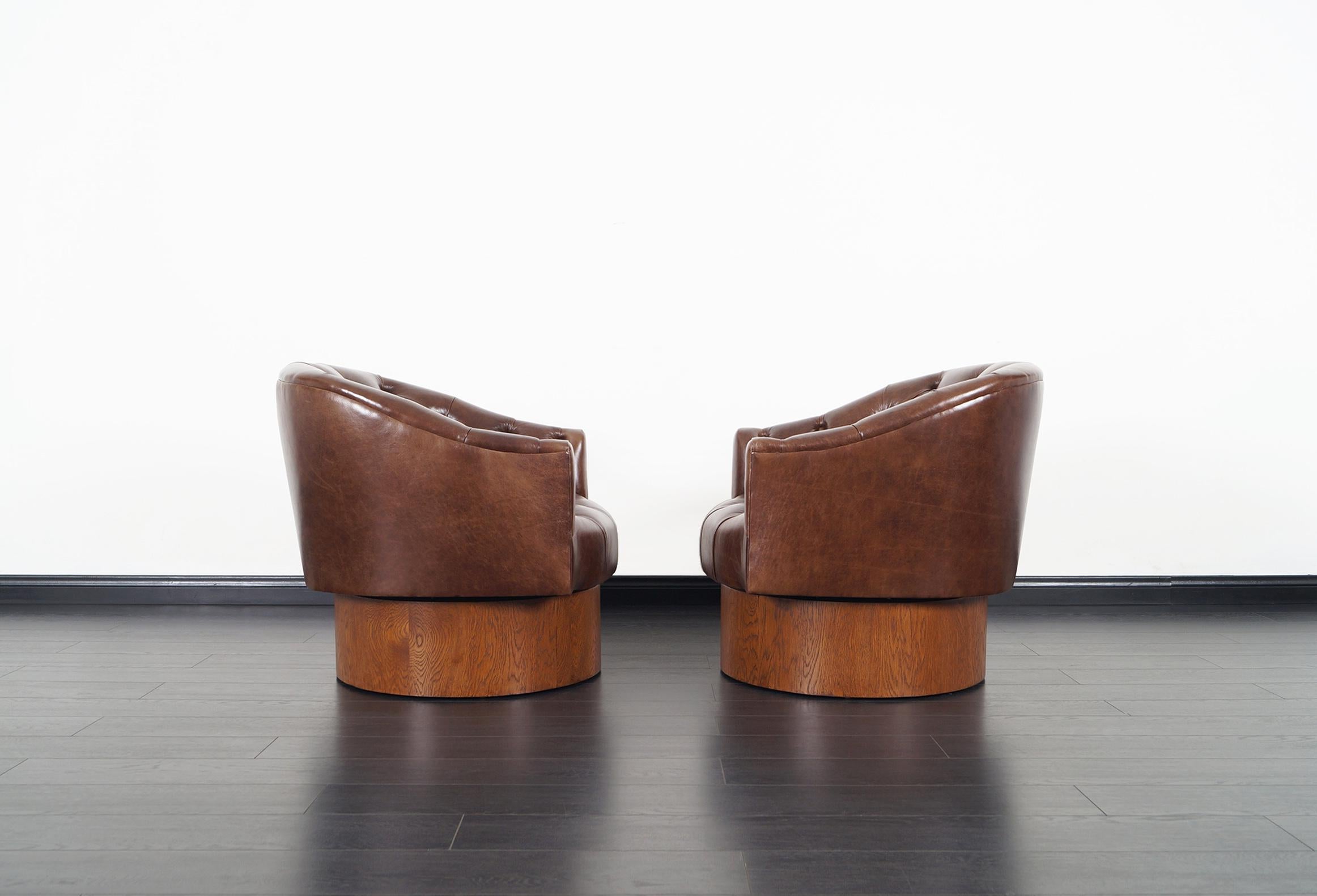 American Vintage Leather Swivel Lounge Chairs by Milo Baughman