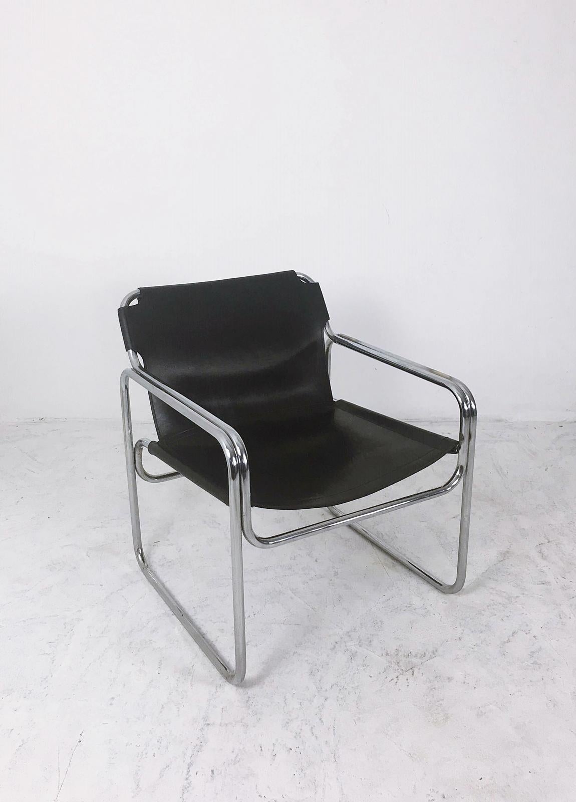 Unique piece of design is a great example of the radical Bauhaus aesthetic. Original, yet simple and functional this particular chair was produced in 1960. Superb patina to the saddle leather. The combination of this design and these materials stays