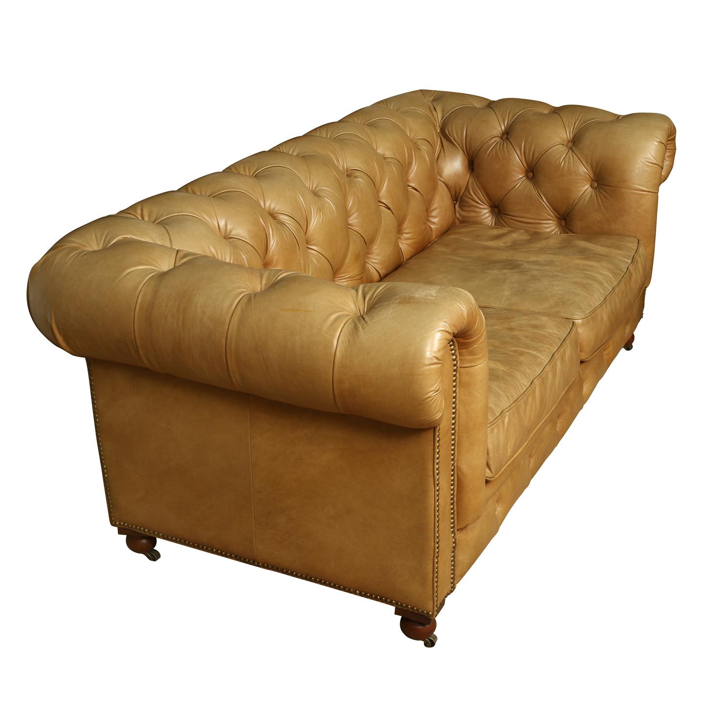 Vintage leather tufted Chesterfield loveseat.