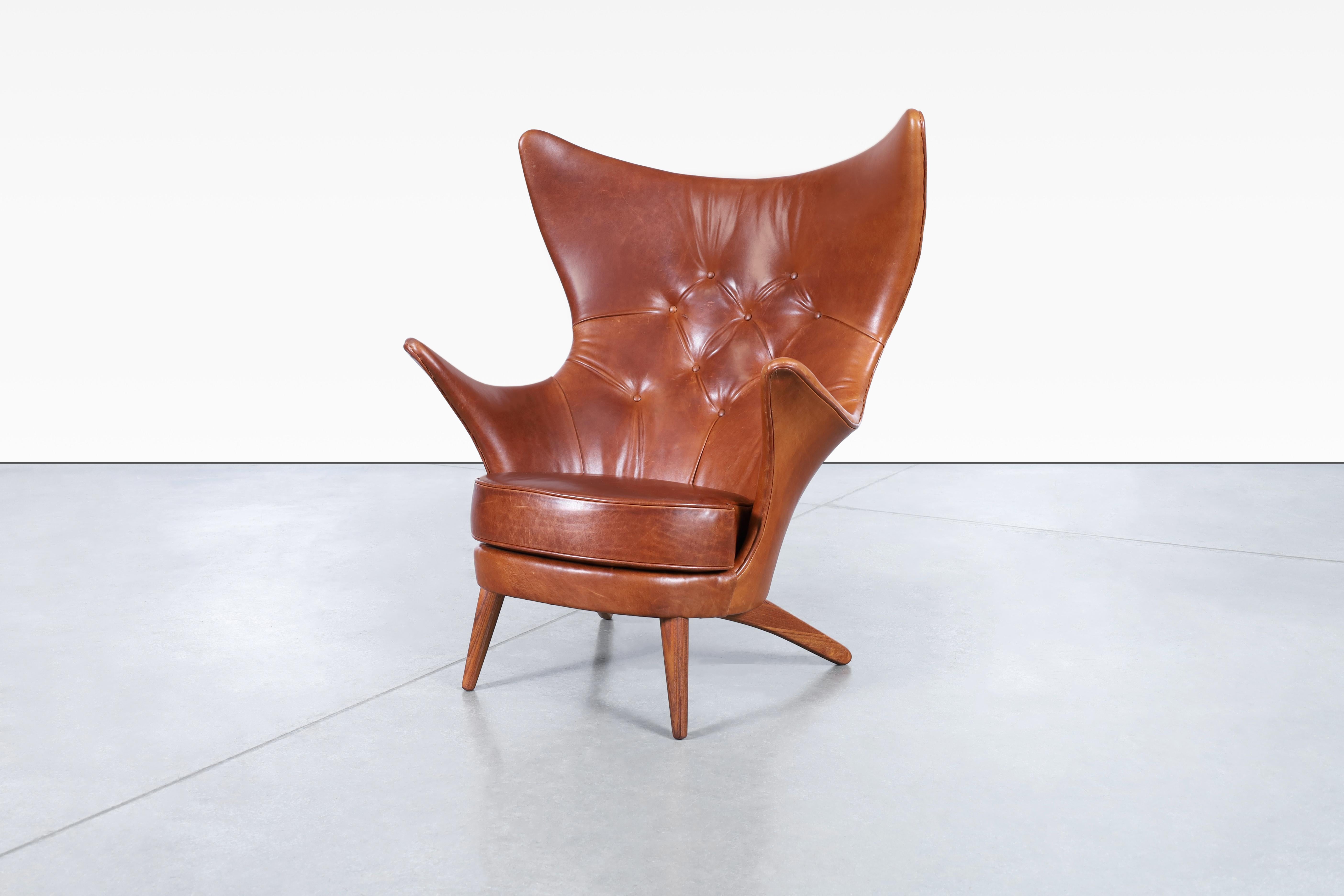 Danish Vintage Leather Wingback Lounge Chair by Kai Bruun For Sale