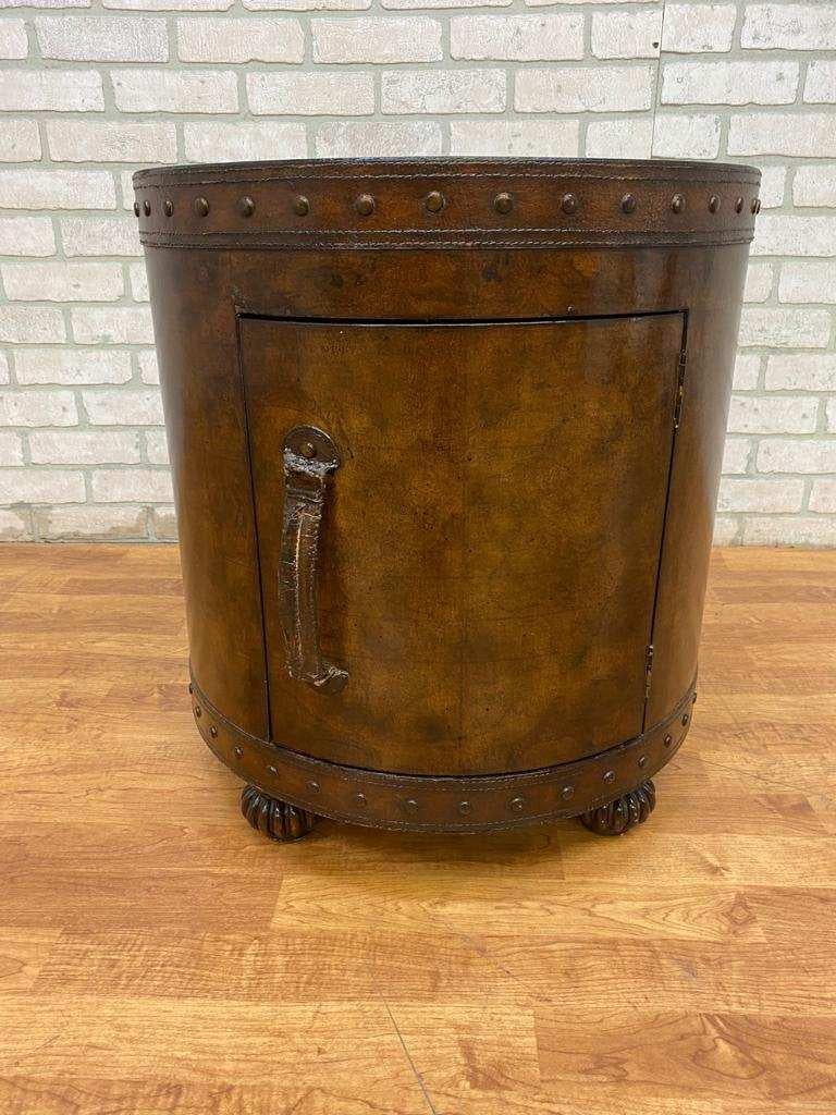 Vintage Leather Wrapped Old World Map Storage Side Table

This beautiful old world map is charming in structure which has been wrapped in a laminated old world map paper glazed with lacquer. The top and bottom of the table has an upholstered nail