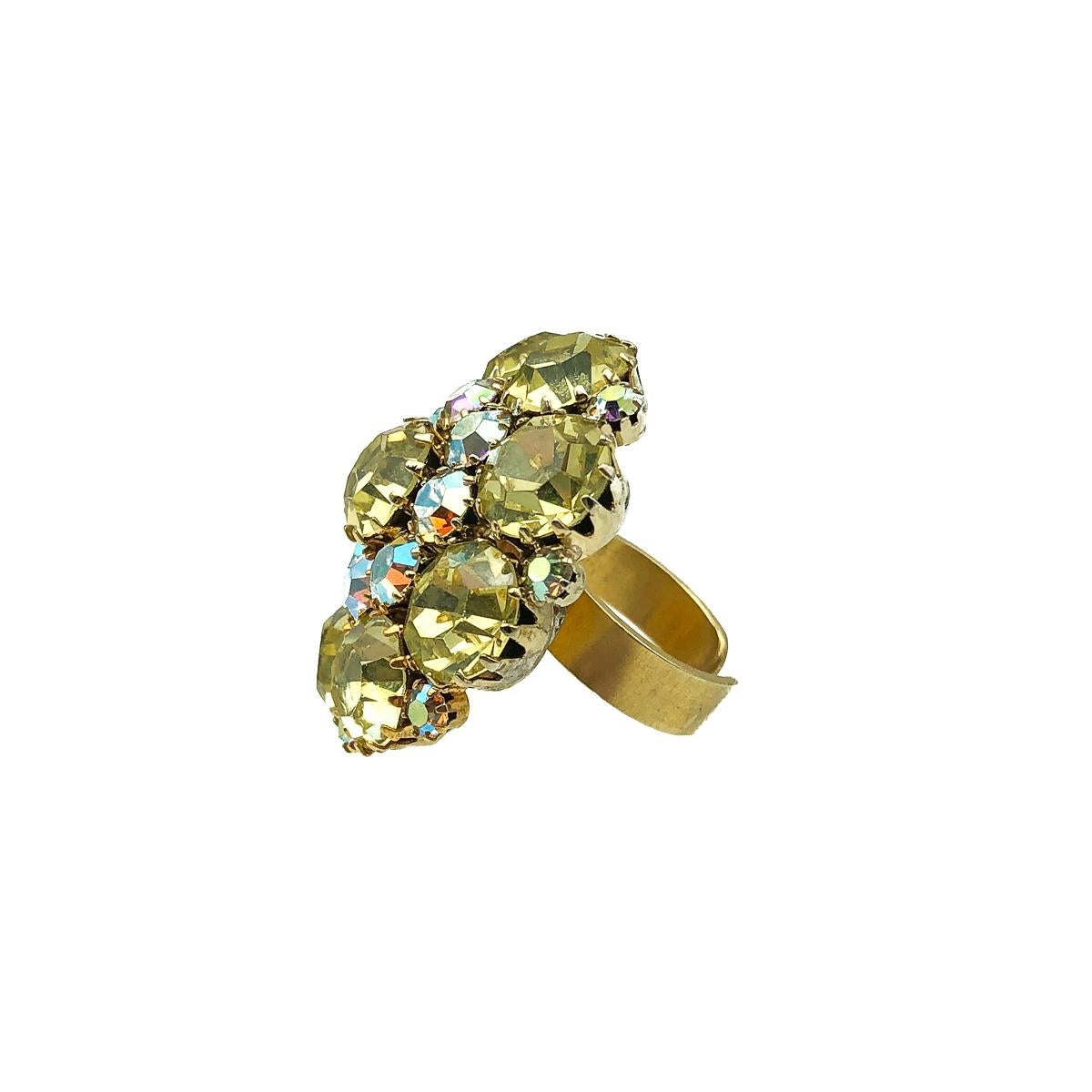 A statement Vintage Lemon Cocktail Ring. Featuring large claw set acid yellow crystal stones with aurora borealis crystals. Most likely a professionally converted ring comprising a glorious original 1950s brooch for the top teamed with a modern