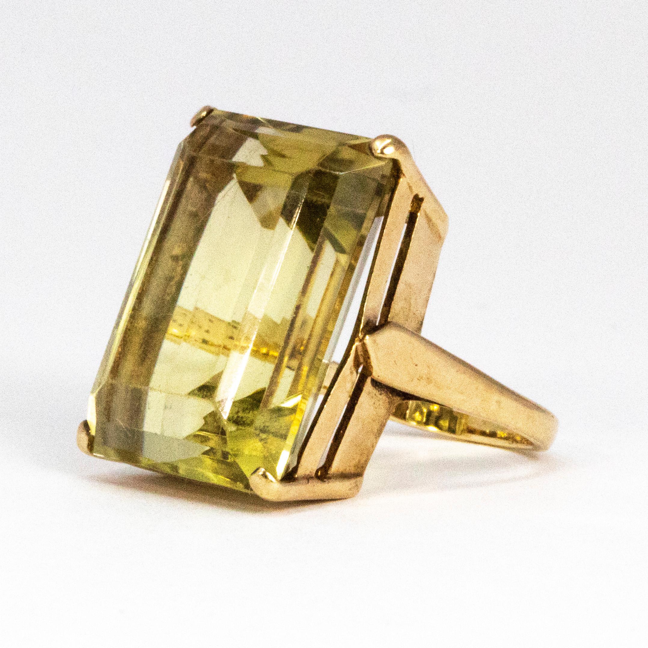 This lemon coloured stunner is a sure show stopper. The giant citrine is a pale yellow and is set in simple single 9ct gold claws. The band itself is simple too, this does not take any attention away fro the stunning stone. 

Ring Size: J 1/2 or 5