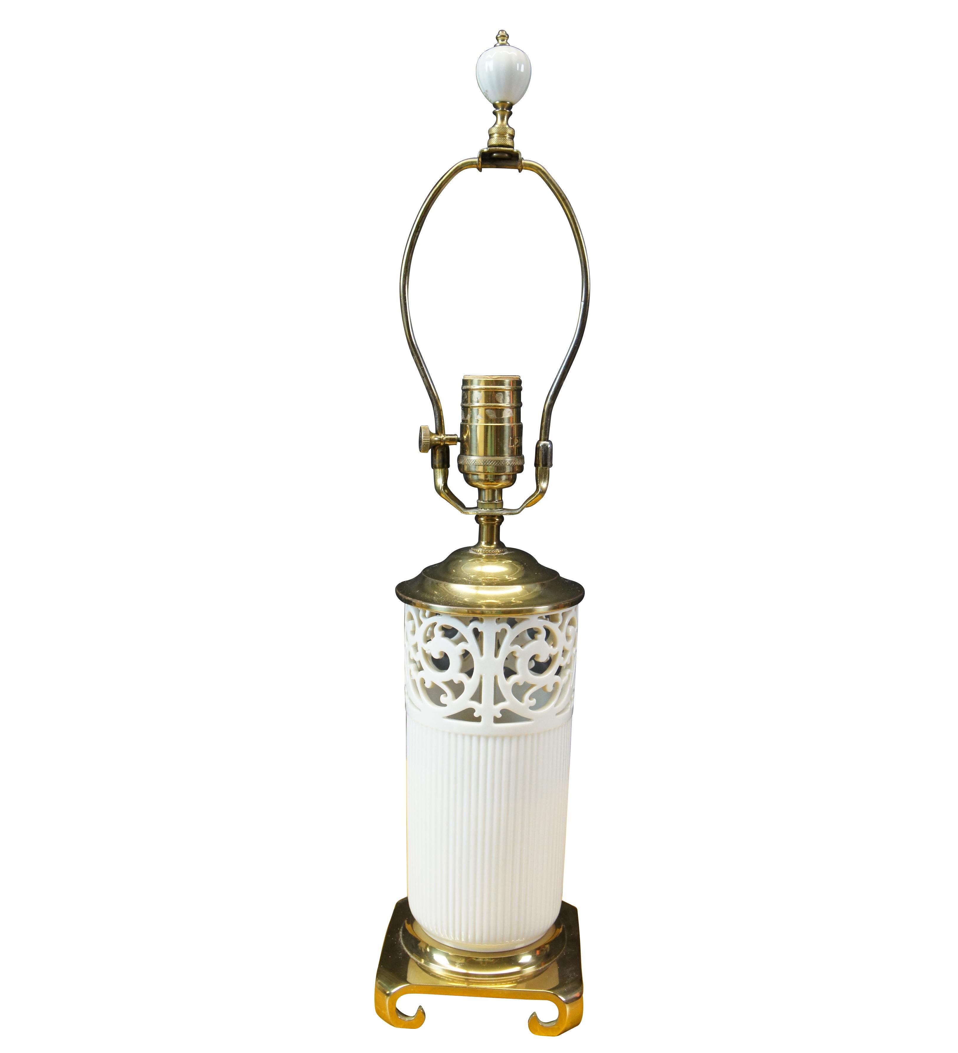 Lenox by Quoizel reticulated porcelain and brass table lamp. circa last quarter 20th century. Includes shade.

Measures: 4.5