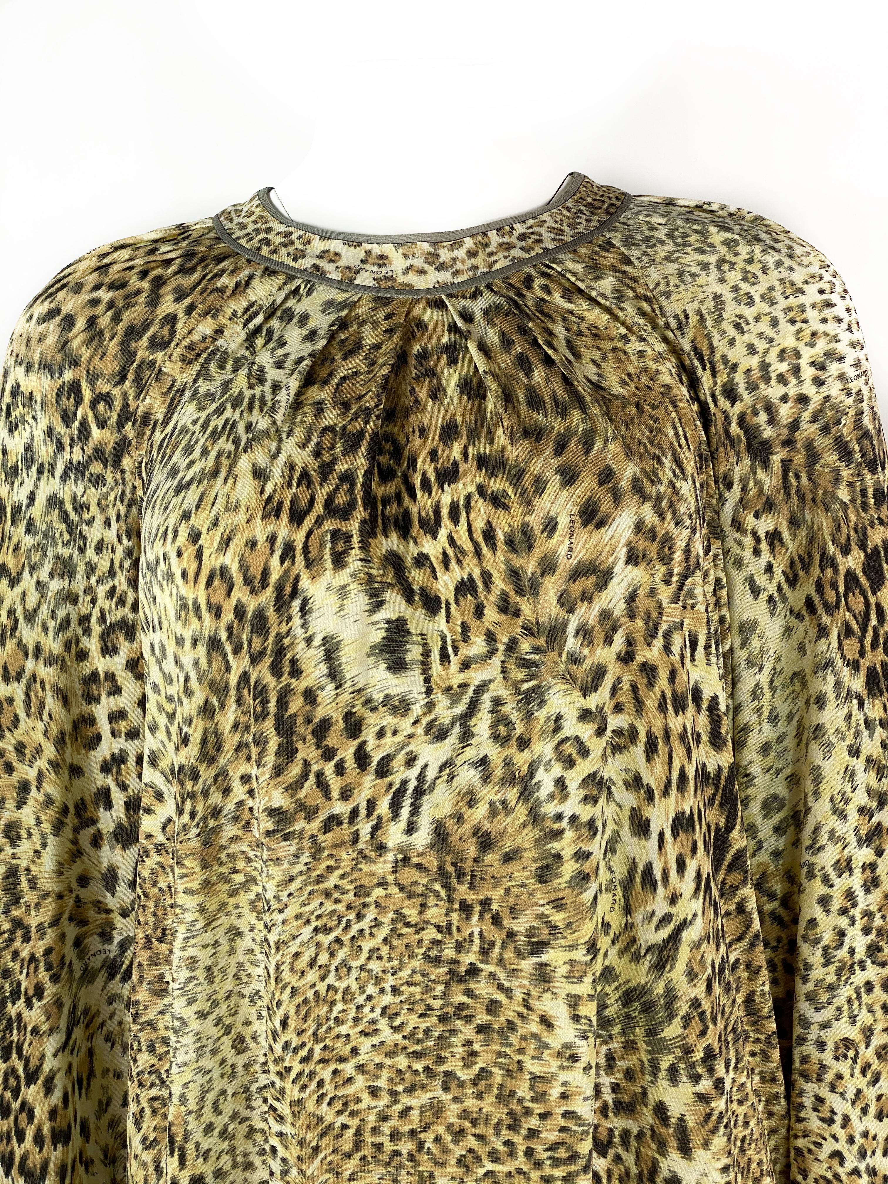 Vintage LEONARD Paris Silk Leopard 3/4 Sleeve Mini Dress Size 42

Product details:
Size 42
Beige/ light brown leopard print with LEONARD 
Rear zip closure
¾ sleeves measure 22” long from the shoulder
Made in Italy
