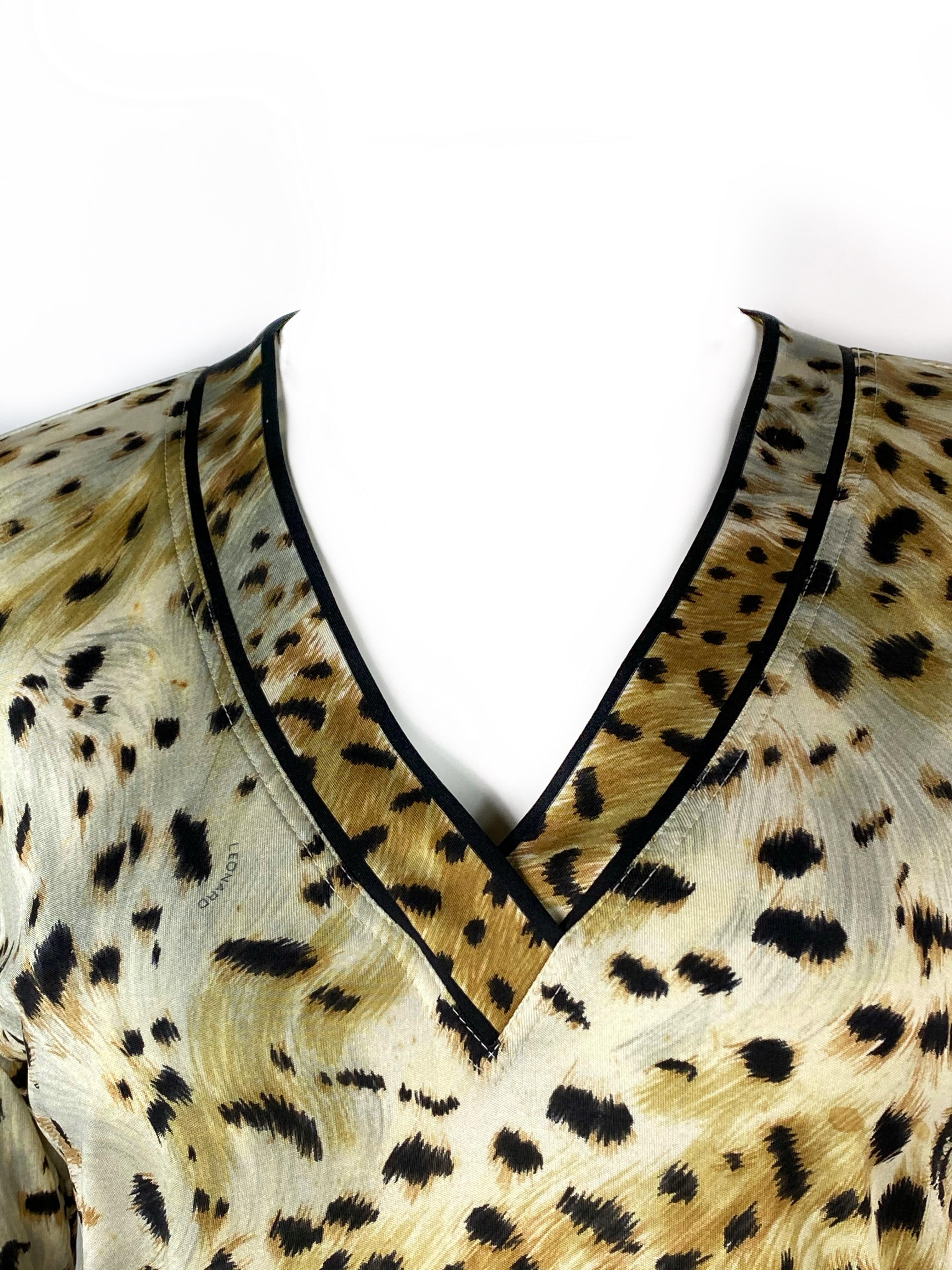 
Vintage LEONARD Paris Silk Leopard V Neck Long Sleeve Top Size 38

Product detail:
Size 38
Leopard and LEONARD print 
Long sleeve
V neck front cut out, drops 9 inches long 
Made in Italy
