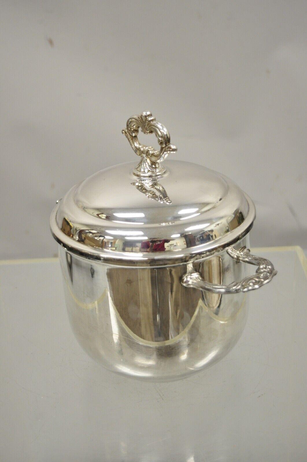 Vintage Leonard silver plate lidded ice bucket regency style insulated. Item features an insulated Interior, ornate twin handles, original stamp, very nice vintage item. Circa mid-20th century. Circa 10