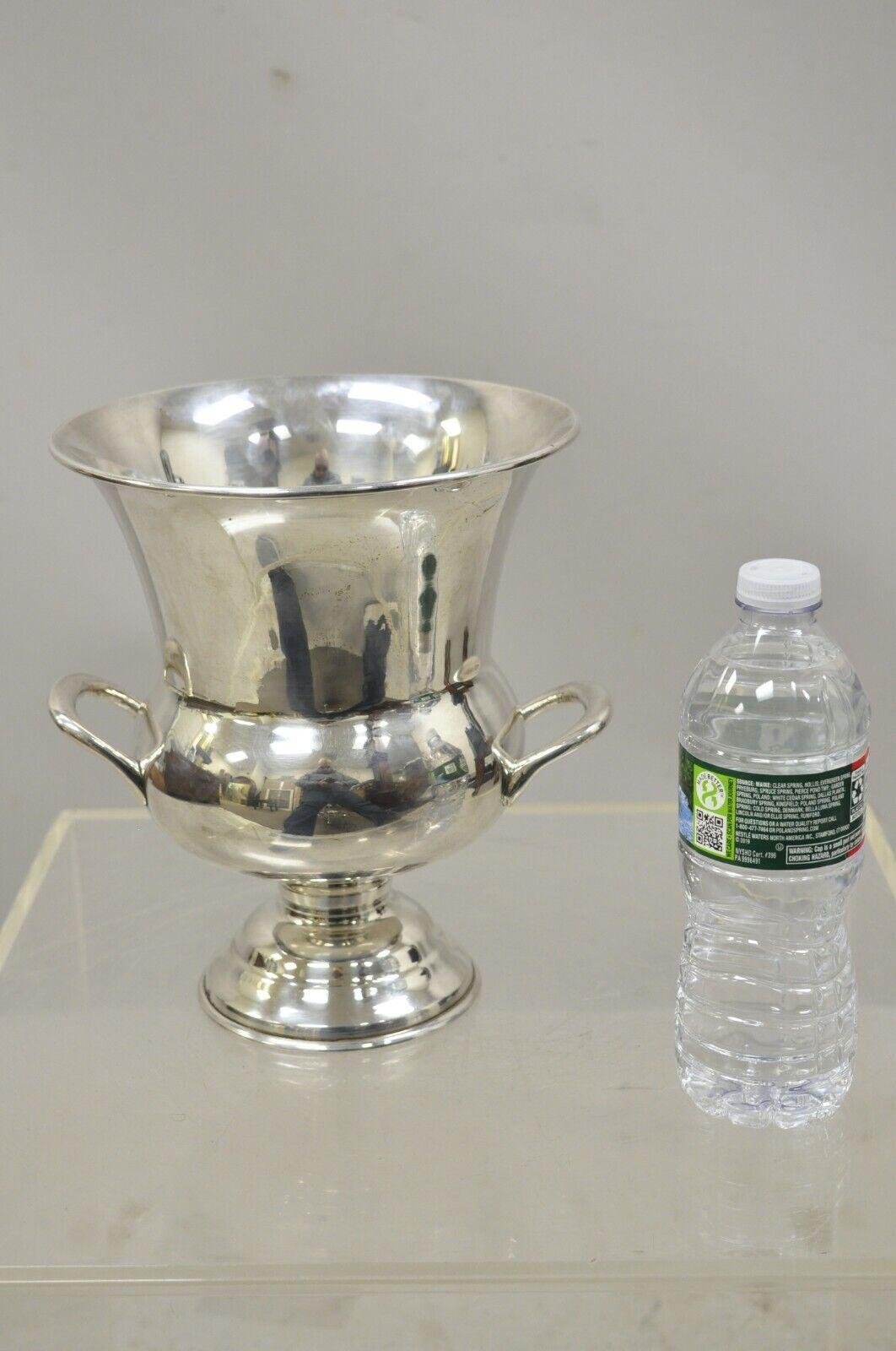 Vintage Leonard Silver Plated Trophy Cup Ice Bucket Champagne Chiller - a Pair. Item features an original stamp, clean modernist lines, great style and form. Circa Mid to Late 20th Century. Measurements: 9.5