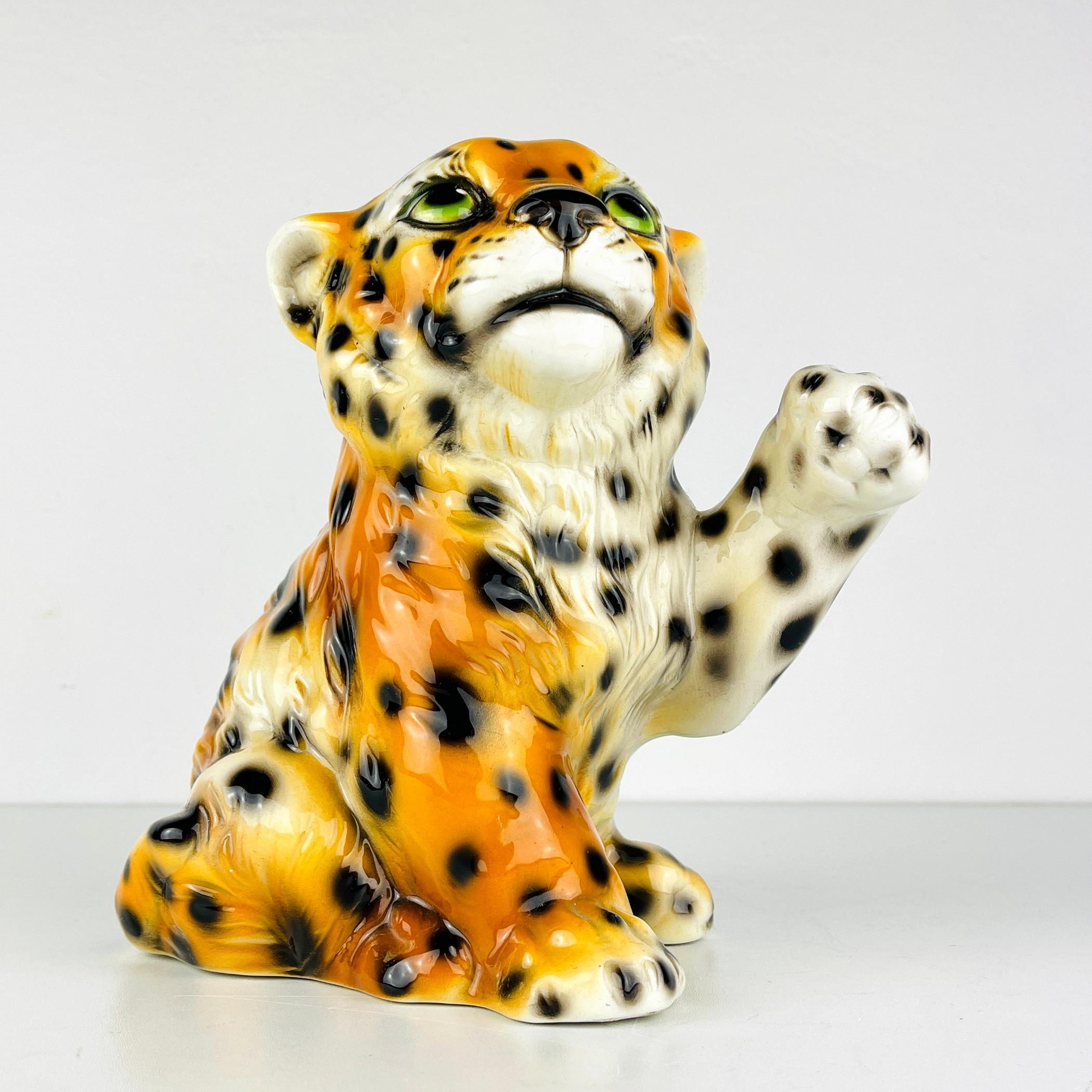 Beautiful cute leopard made in Italy in the 1960s from glazed ceramics. In very good vintage condition, no damage. It will undoubtedly decorate your home or office. Width: 18 centimeters Height: 21 centimeters Depth: 21 centimeters.