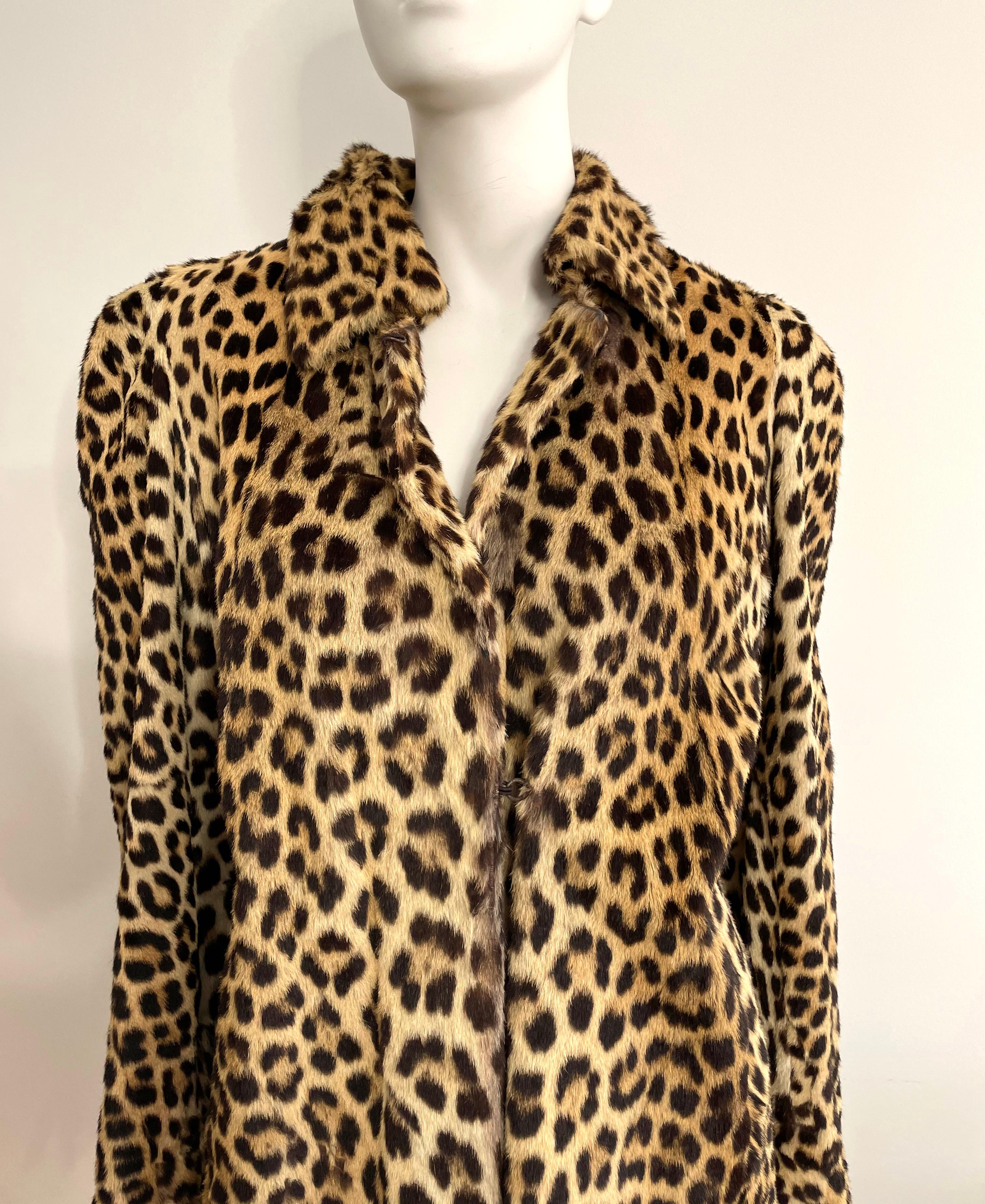 Stunning Sheared Fur with a leopard print. Lining in wonderful condition. The best fit is 6-8. Please compare our measurements with a piece of clothing that fits you. Please be sure to check our storefront for more fashion as we have both Vintage