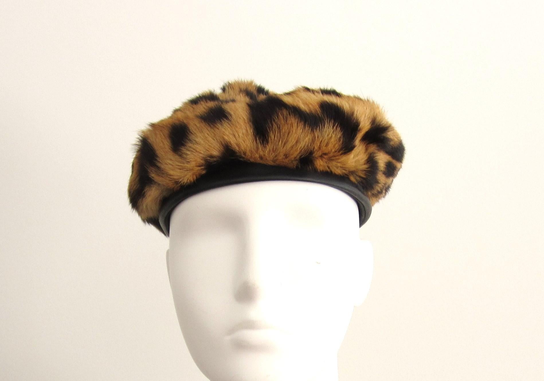 Stunning Leopard Beret with a leather band. Has a Saks 5th Ave. Label as well as being Monogrammed JM. Measuring 22