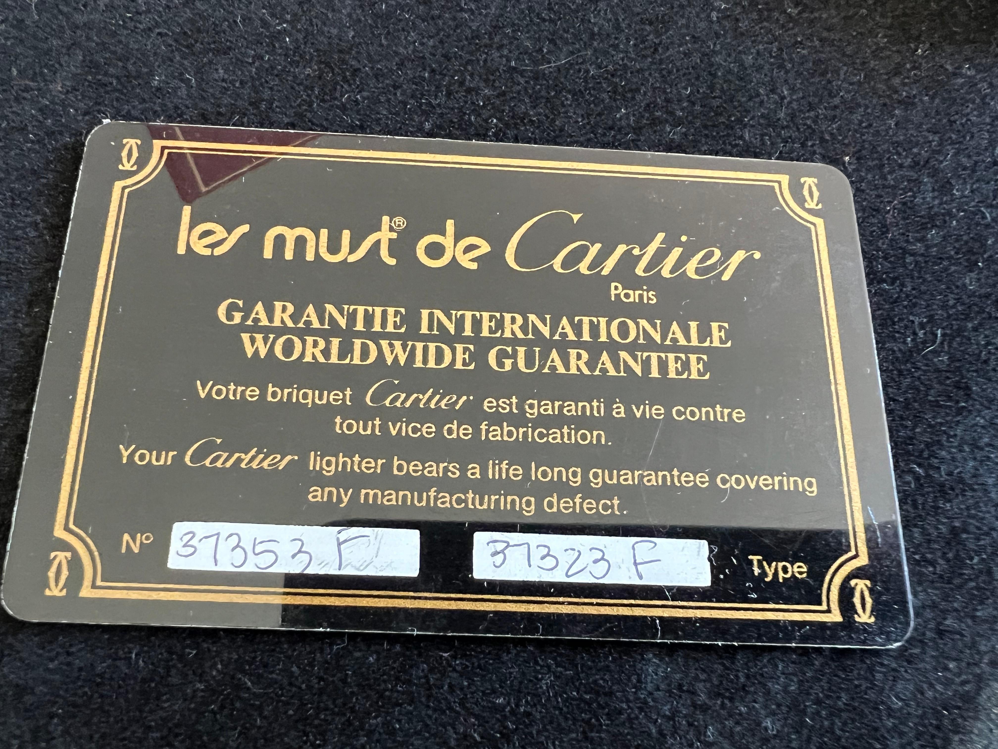 Briquet vintage Les Must de Cartier Paris plaqué or 18 carats, vers 1980 en vente 6