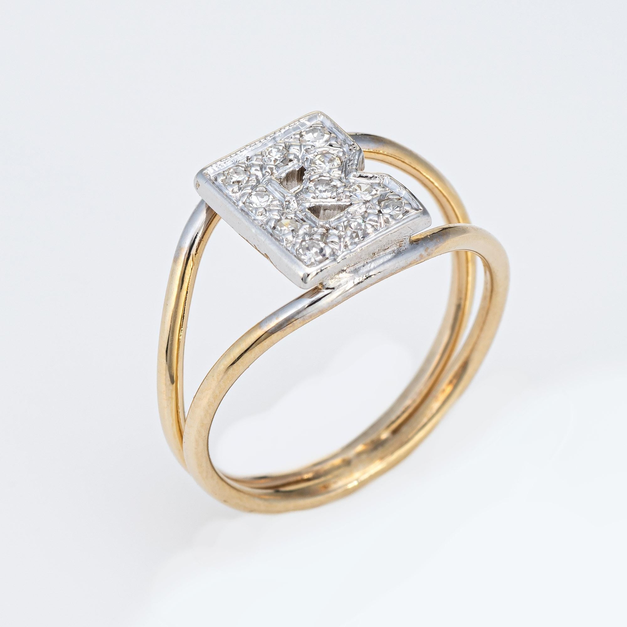 Stylish vintage letter 'B' diamods ring (circa 1970s) crafted in 14 karat yellow gold. 

11 single cut diamonds total an estimated 0.05 carats (estimated at H-I color and VS2-SI2 clarity).  

The diamond set letter 'B' sits upon a split shank band.