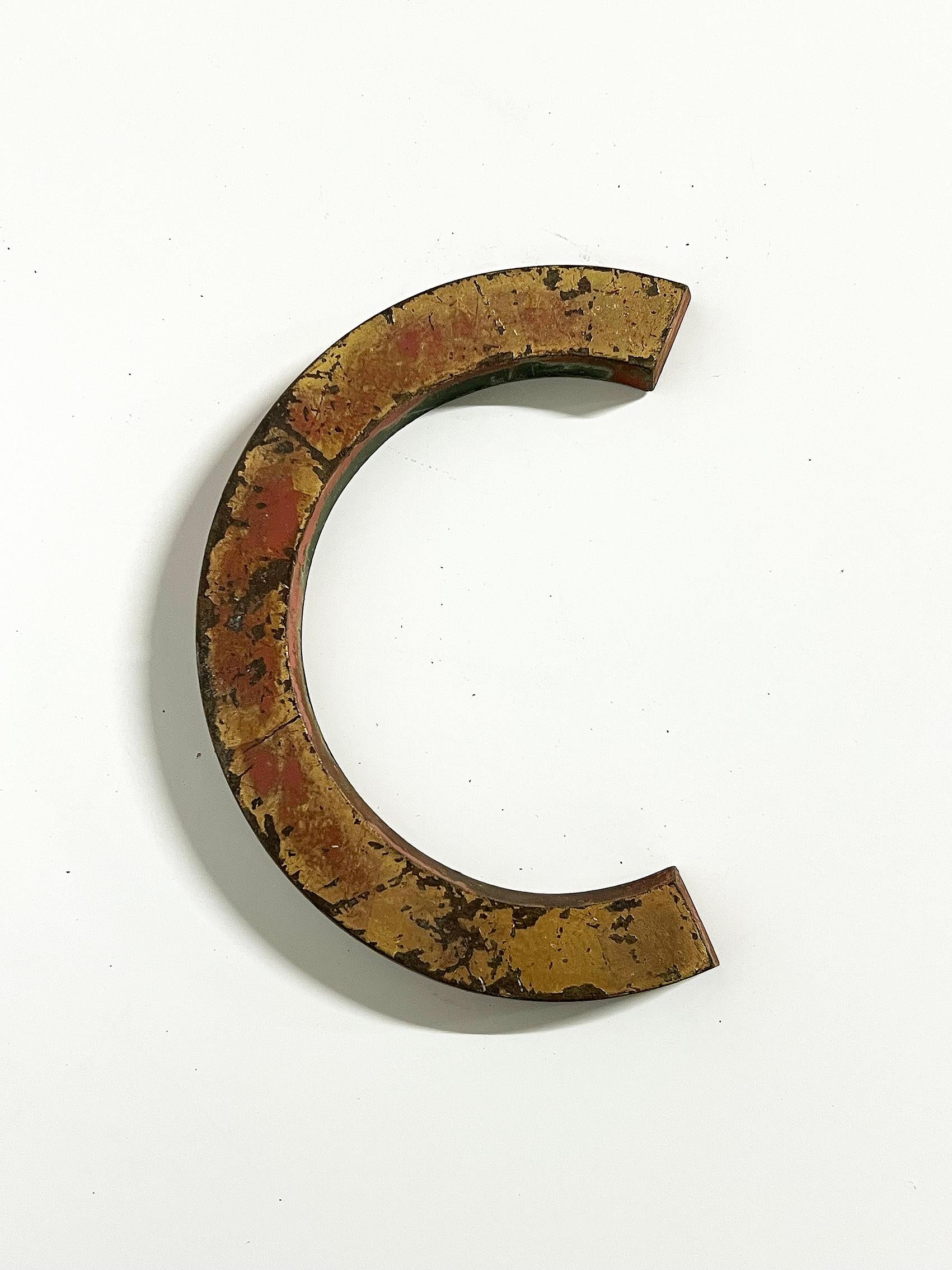 Vintage letter C in solid brass, covered with old paint (red & gold), Sweden ca 1940's.
Wear and patina consistent with age and use. Paint loss as seen on the pictures.
