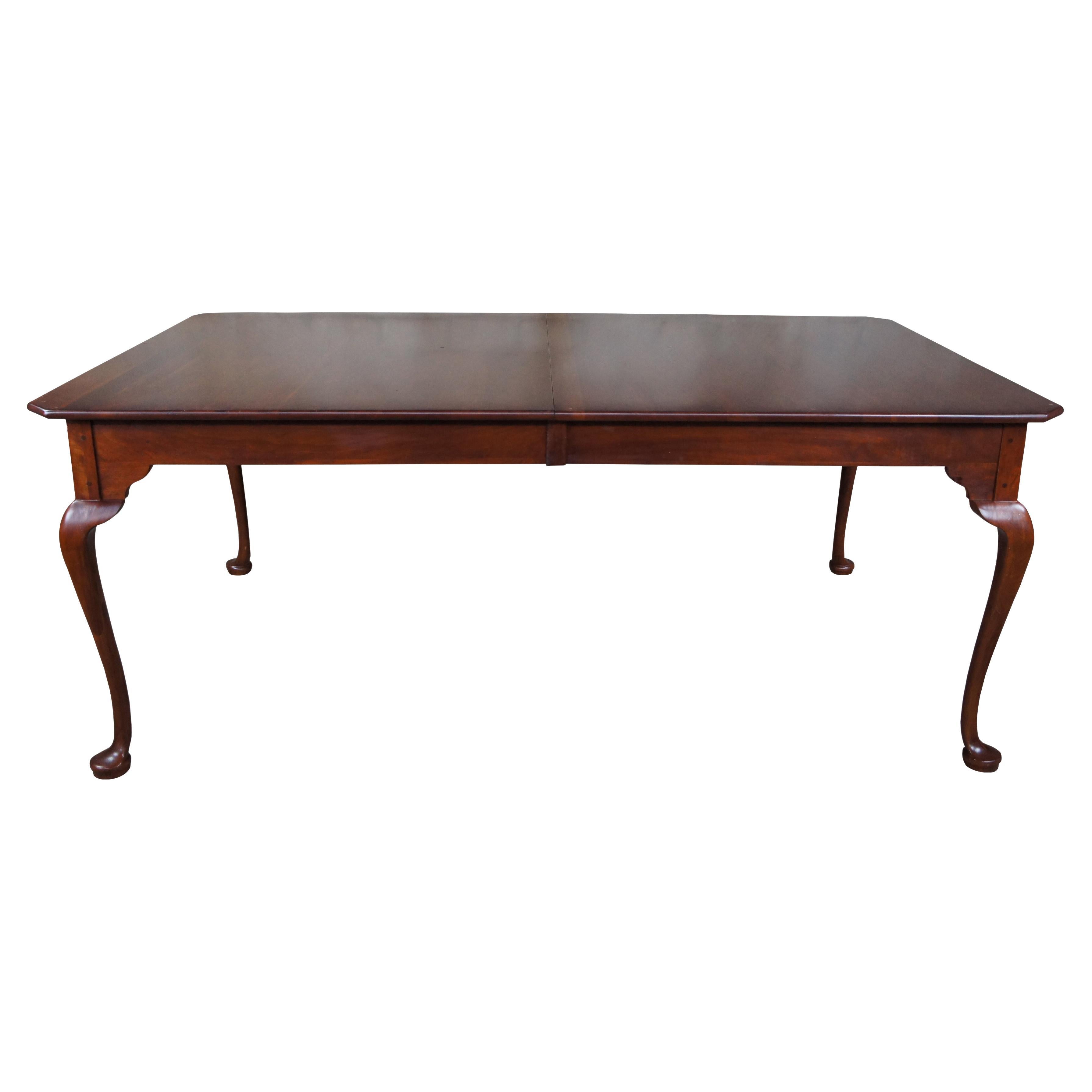 Vintage Lexington Furniture Bob Timberlake dining table. Made of solid cherry featuring Queen Anne styling with rectangular form 2 drawers and custom glass top. 833-879.

Measures: 45