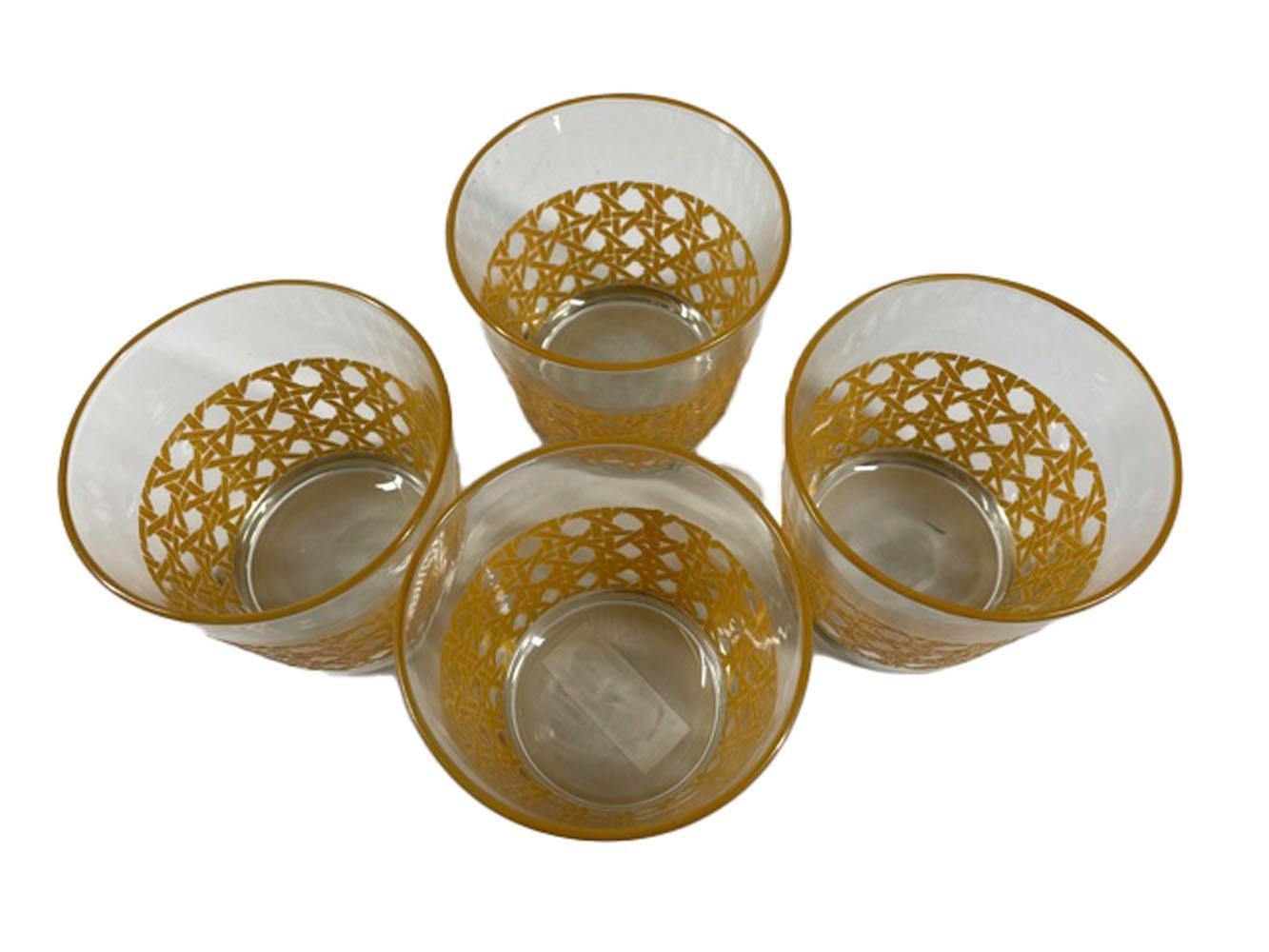 Four mid-century Libbey Glass Co., old fashioned glasses, the lower half with raised enamel 