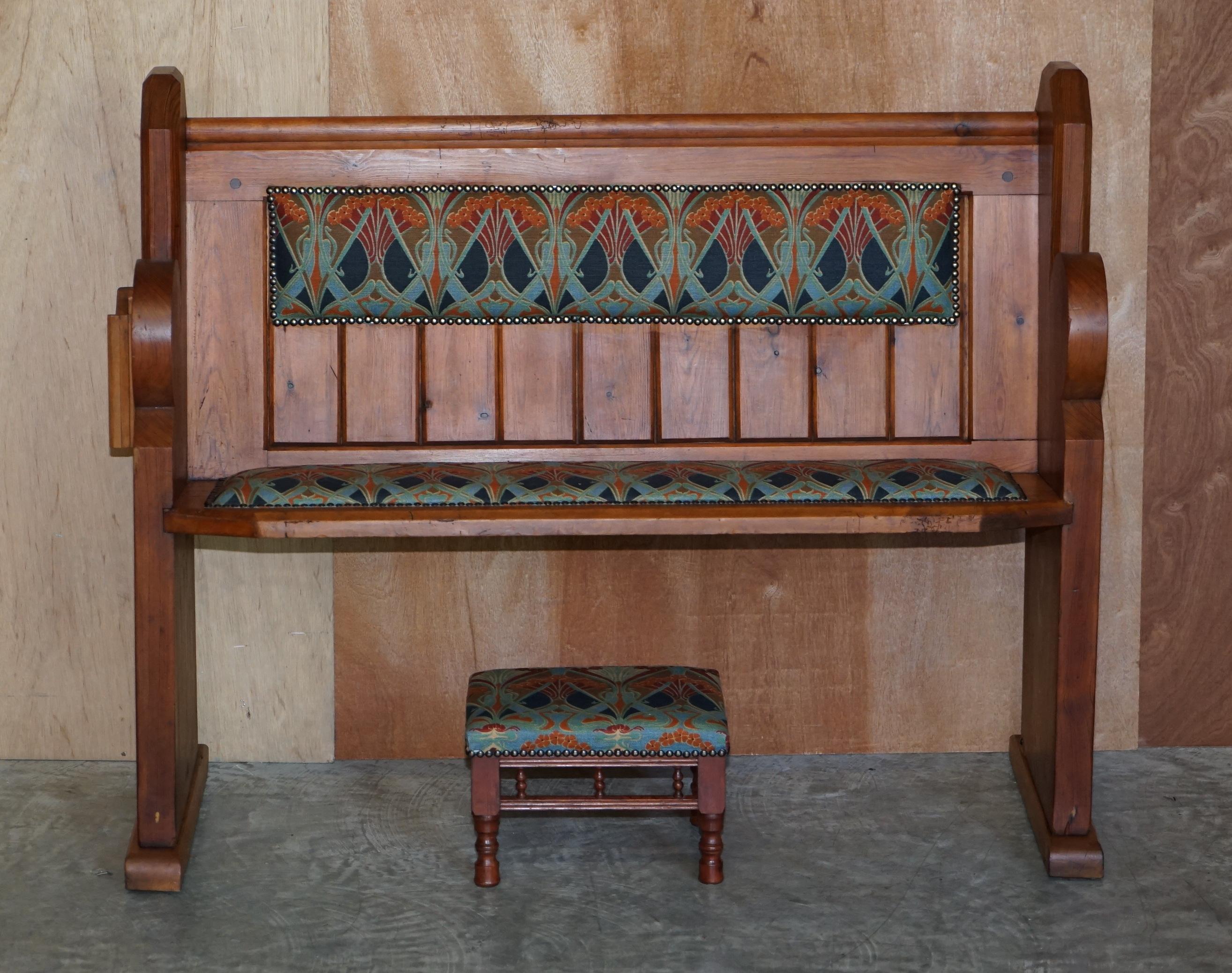 We are is delighted to offer for sale this lovely vintage Liberty’s London Ianthe upholstered pitch pine pew bench and matching footstool

A good looking and decorative suite. This was most likely made to go with a kitchen table or for a hallway,