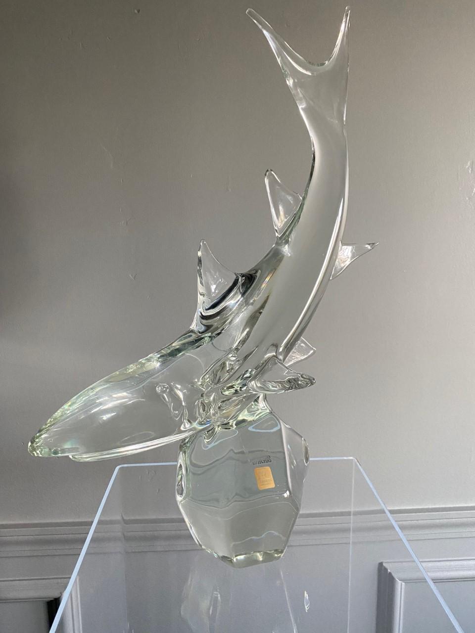 Beautifully crafted sculpture by Licio Zanetti, circa 1960s. The condition of the glass is clean, sharp and clear with no scratches. This sculpture is ice like and fluid. The quality of the Murano glass is undeniable and allows the piece to move