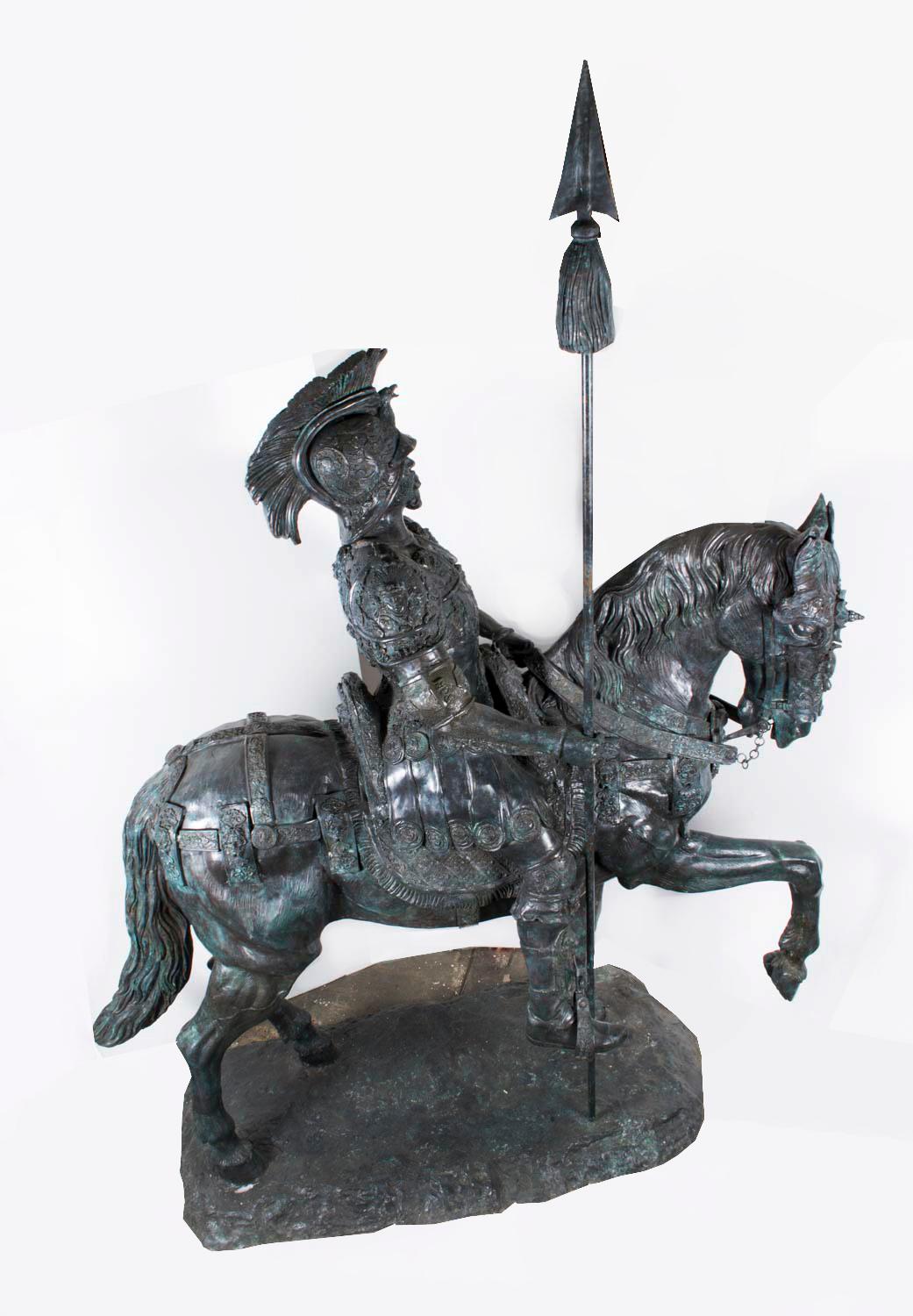 This is a beautiful ornately decorated Vintage life size bronze sculpture of a heavily armored Roman Cavalry officer  on horseback, riding triumphantly into battle, dating from the late 20th Century.

The armour is decorated in high relief with
