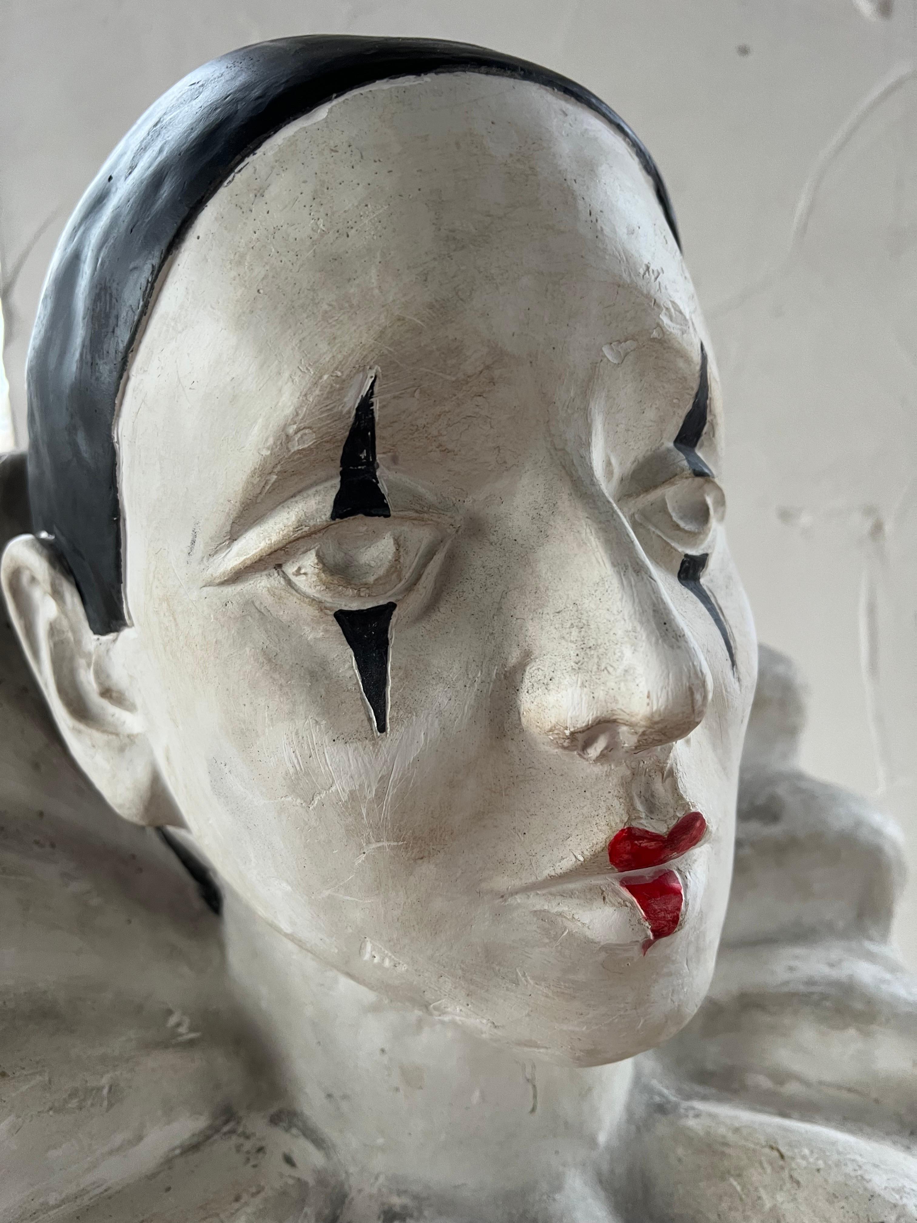 Beautiful vintage French bust of Pierrot, the sad clown or also knwon as the white clown. Was casted approximately in the 1970's / 1980’s. It is solid plaster/white clay and weighs at least 15 kilos. 

Signed on the back 