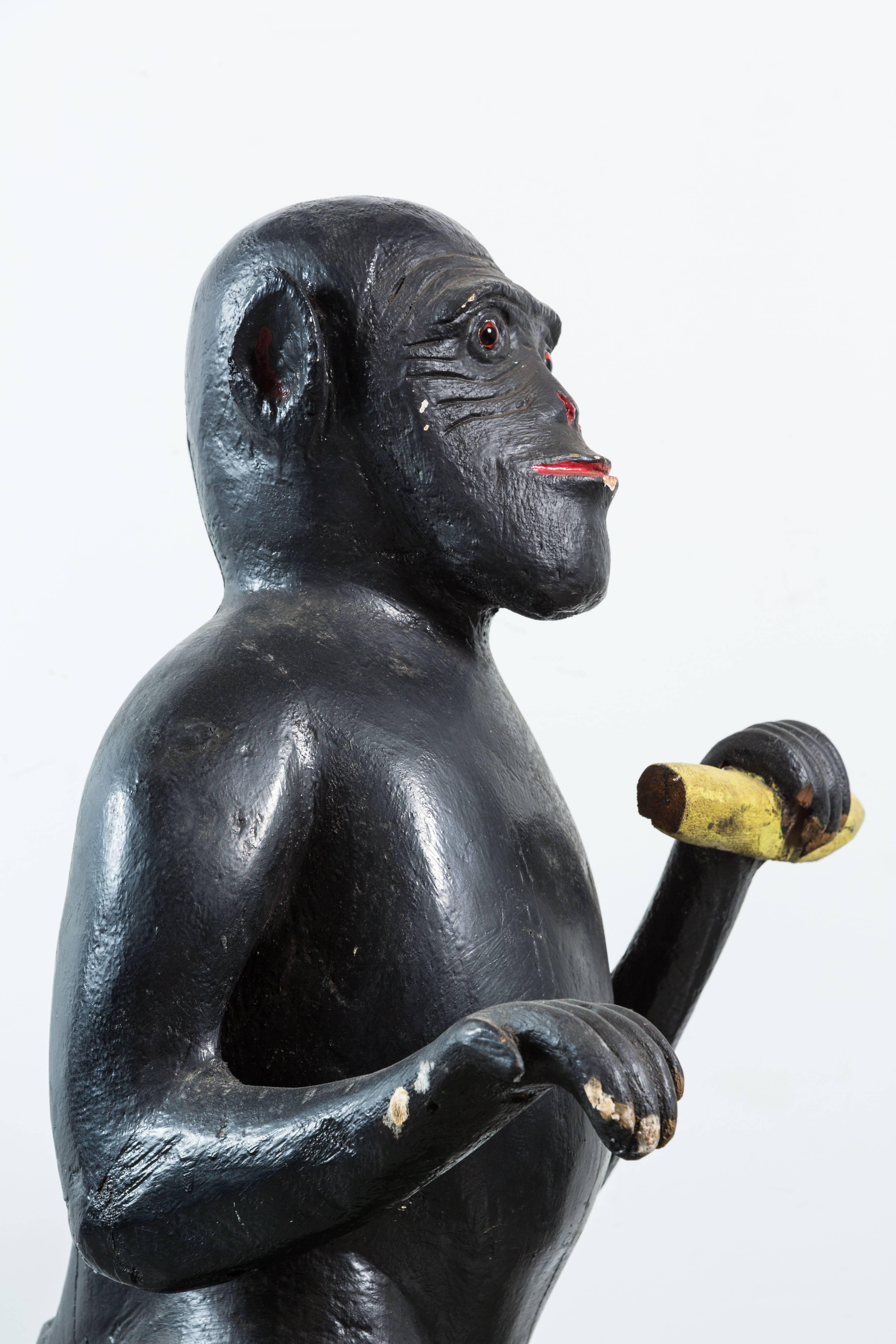 Hand-Painted Vintage Life-Sized Folk Art Wood Monkey and Banana Carving with Glass Eyes