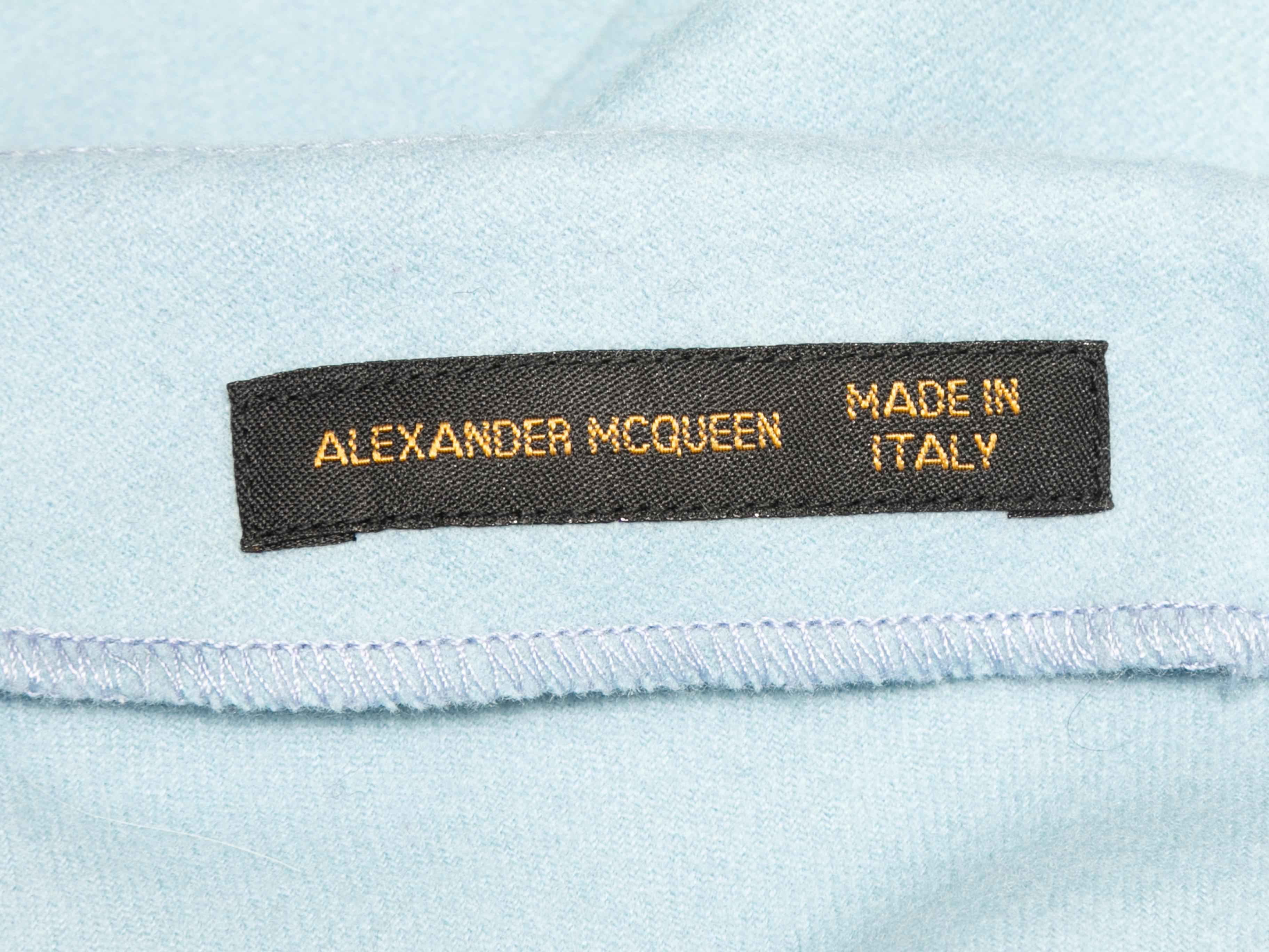 Vintage light blue wool A-line skirt by Alexander McQueen. Circa 1990s. Zip closure at back. 27