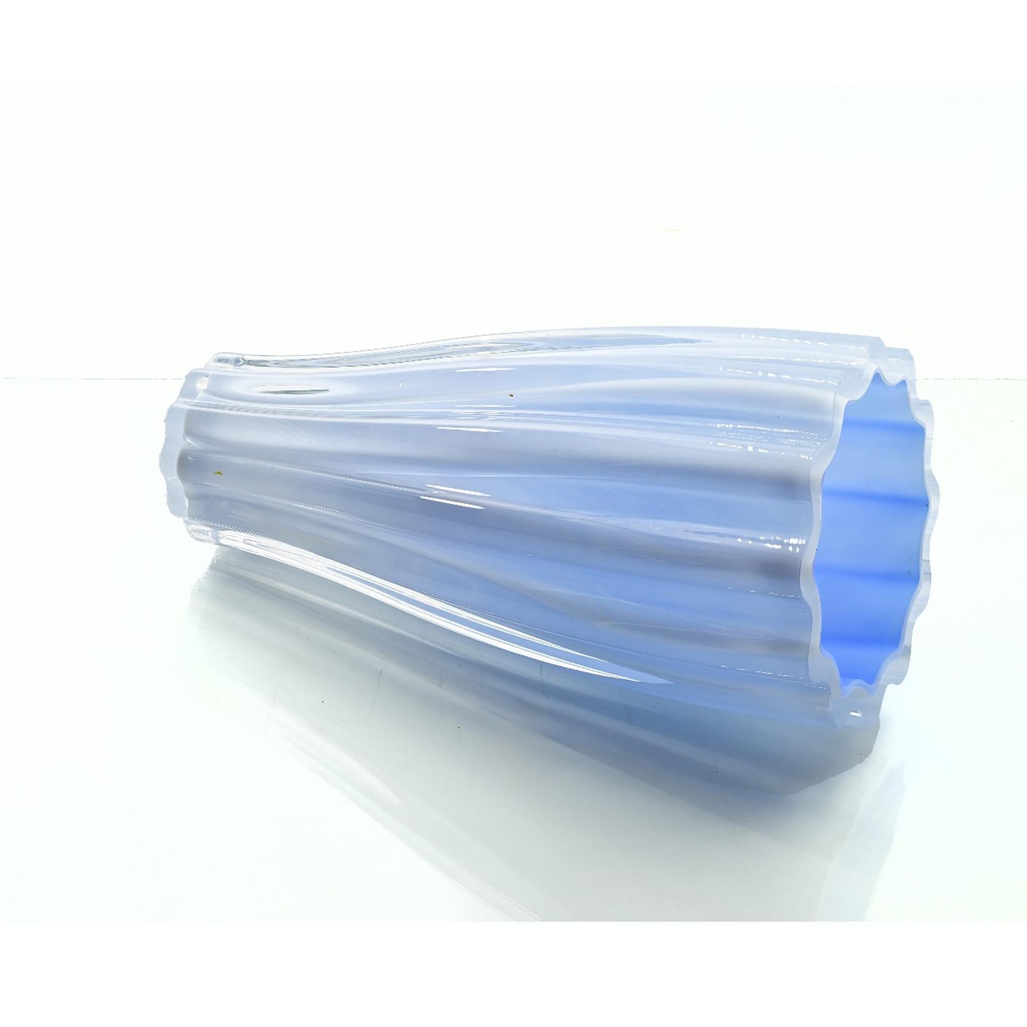 Vintage Light Blue Glass Vase, Northern European, 1970s

Elegant and timeless, this vintage vase from the 1970s showcases the refined artistry of Northern European glassmaking. Crafted in a stunning light blue glass, the piece features a subtly