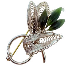 Vintage light gold tone green jade natural stone brooch