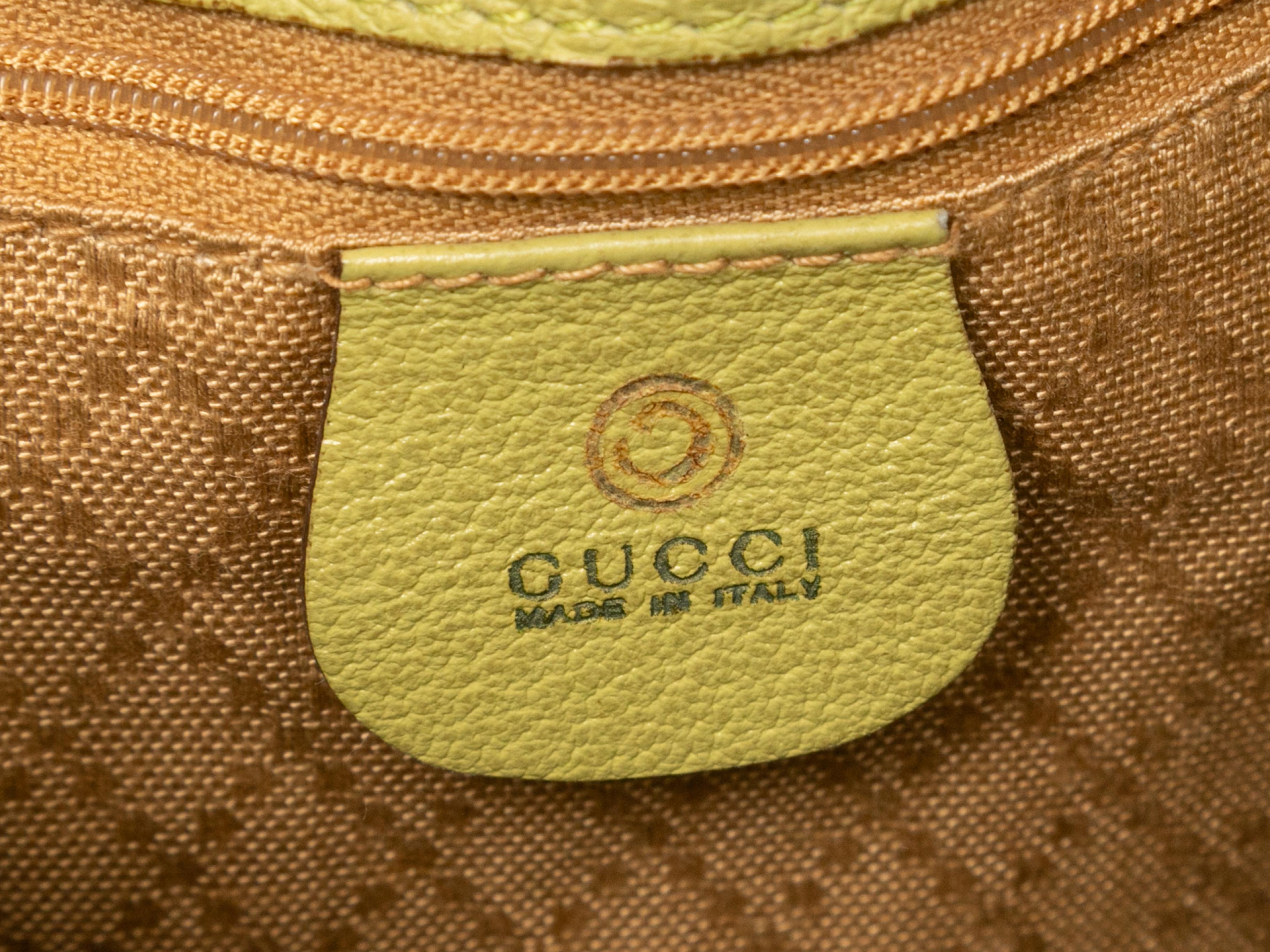 Vintage Light Green Gucci Suede Backpack. Circa 1990s. This backpack features a suede and leather body, gold-tone and bamboo hardware, a front handle, dual flat shoulder straps, and a top drawstring closure. 13