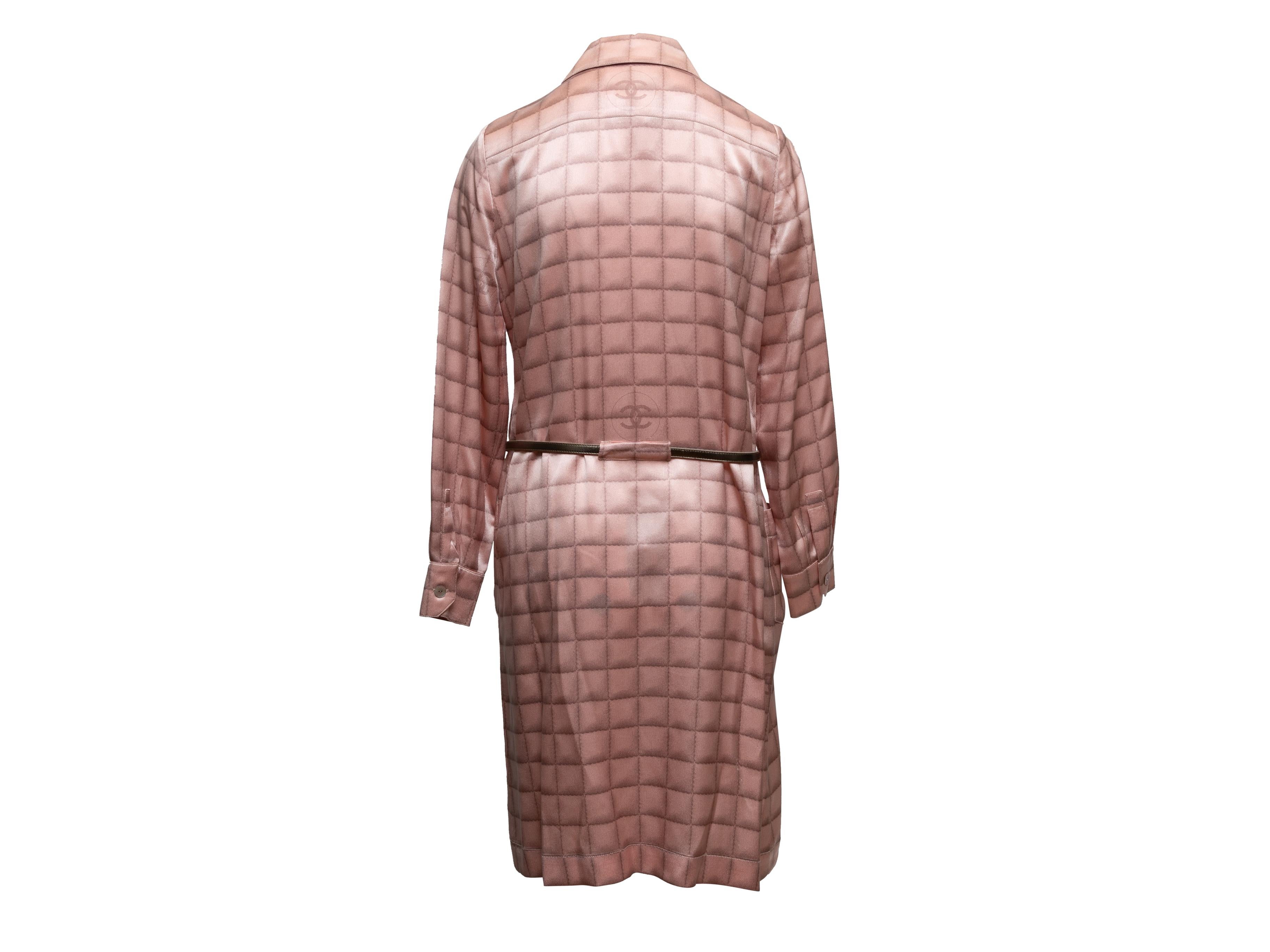 Vintage light pink printed silk dress by Chanel. From the Fall/Winter 2000 Collection. Pointed collar. Long sleeves. Four pockets. Belt at waist. Concealed button closures. 40