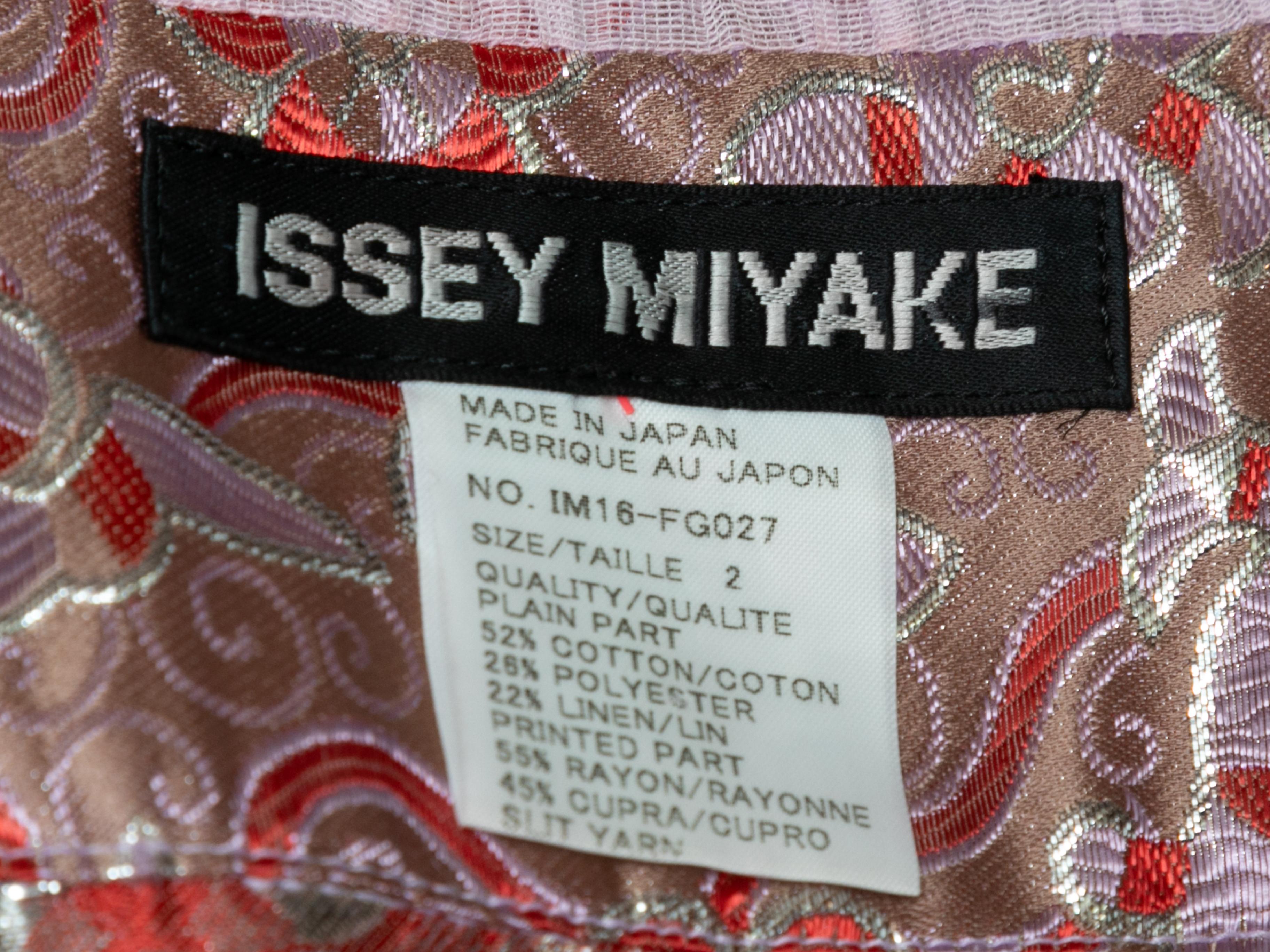 Vintage light pink and multicolor jacquard midi skirt by Issey Miyake. Side button closure. 28