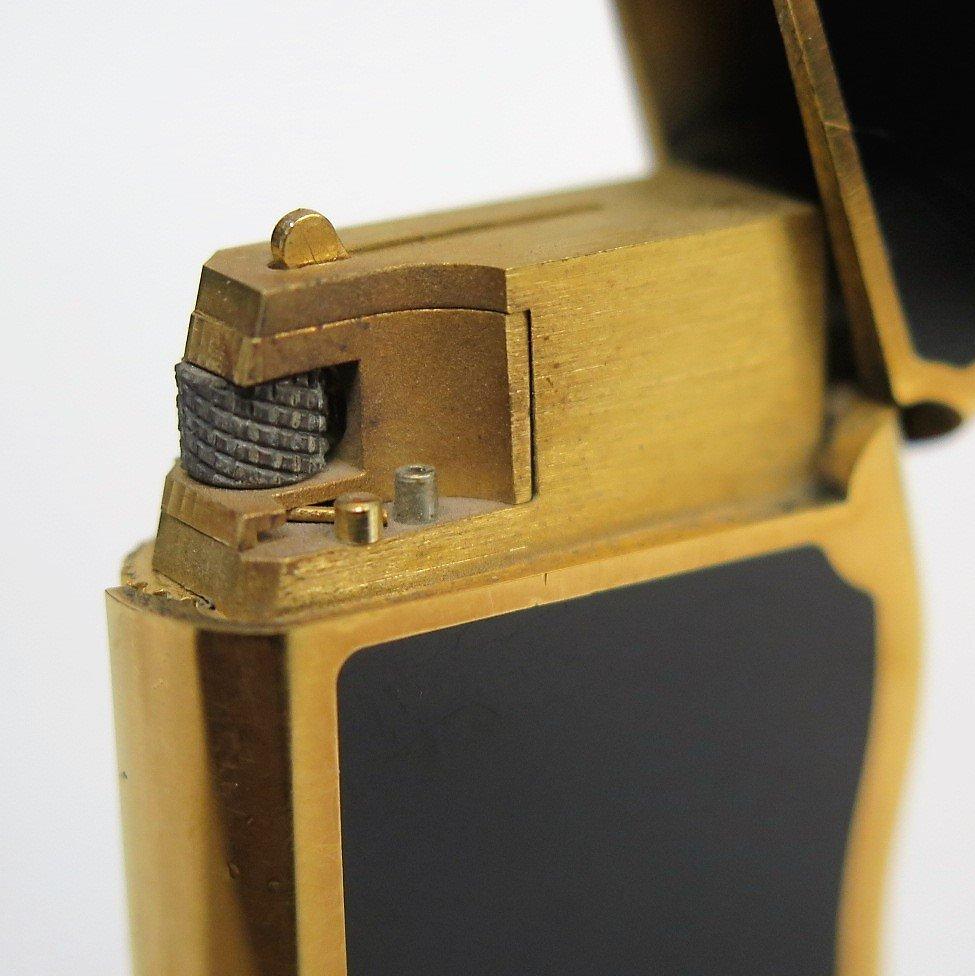 Vintage Lighter by Van Cleef & Arpels, the Gold Plated and Black Enamel Case In Excellent Condition In New York, NY