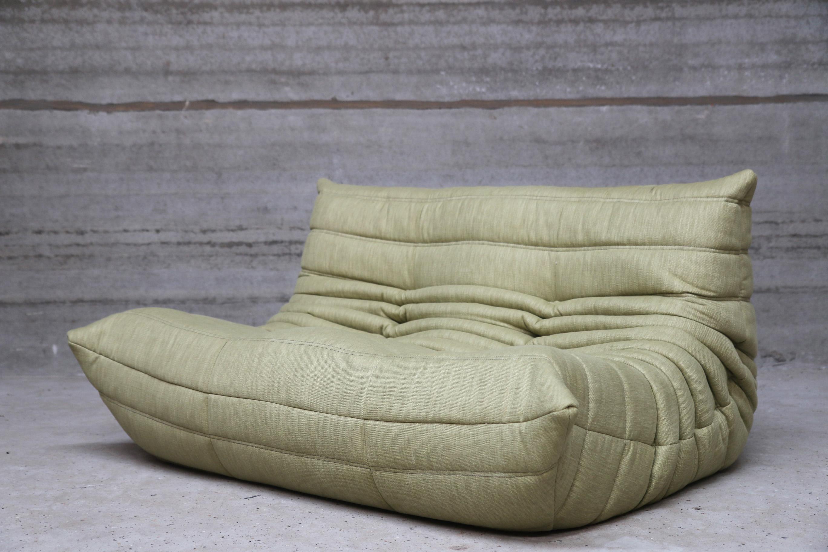 This loveseat was re-upholstered in our newest stain resistant fabric.
Beautiful olive green color. Soft feeling linen look fabric.