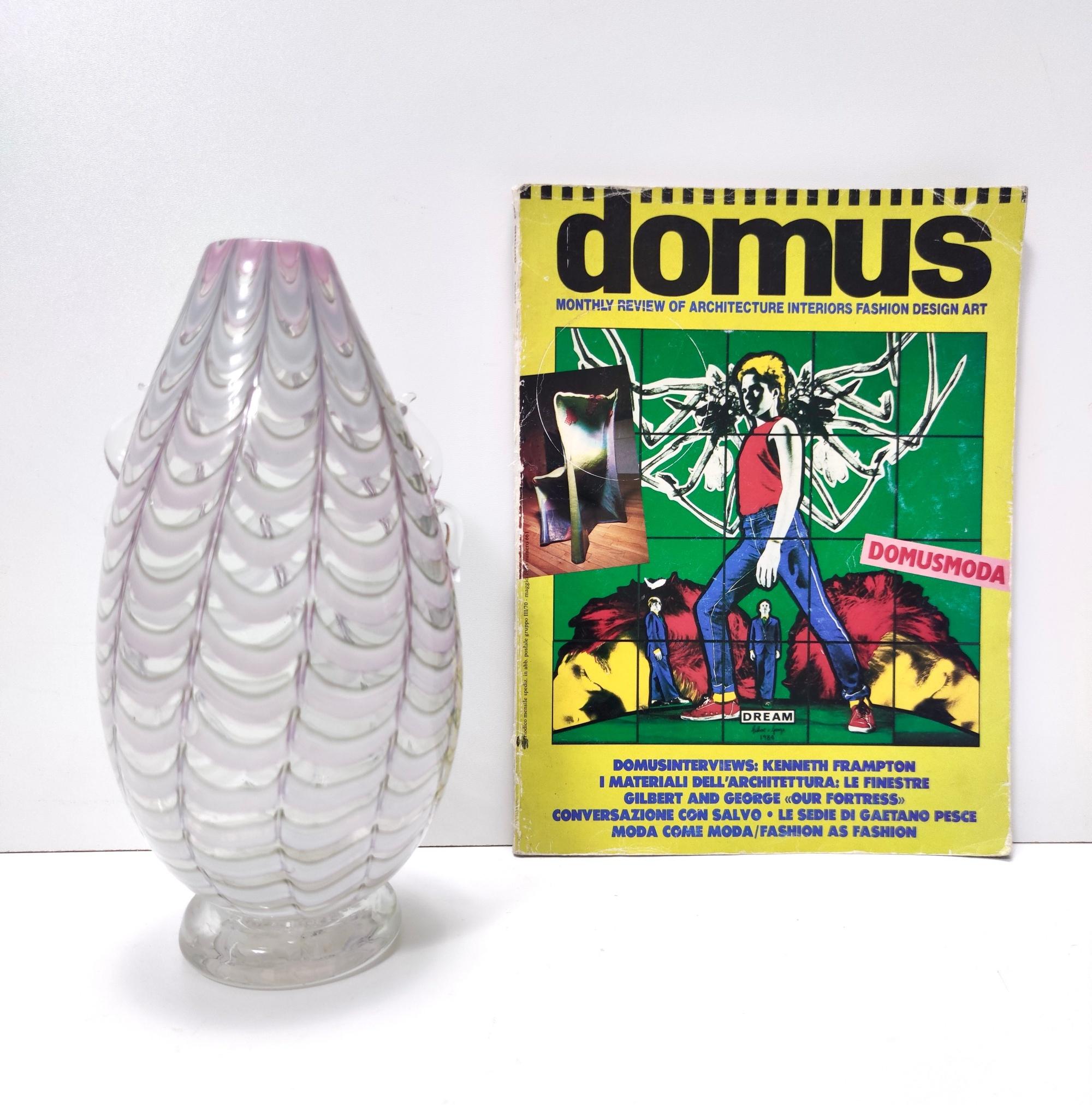 Made in Italy, 1940s.
This is a lilac and transparent Murano glass vase.
It is a vintage item, therefore it might show slight traces of use, but it can be considered as in excellent original condition and ready to become a piece in a home.

It is