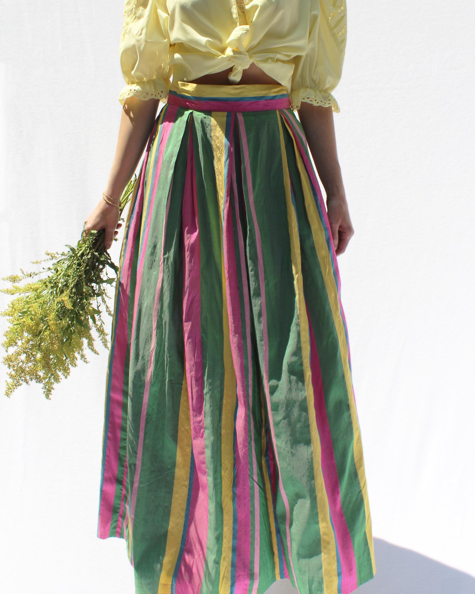 I absolutely love the colors of this vintage Lilly Pulitzer full ballskirt, and the silk dupioni fabric intensifies the vibrant hues of the stripes. It's lined from the waist to the hips, and then there is a yellow tulle petticoat lining which