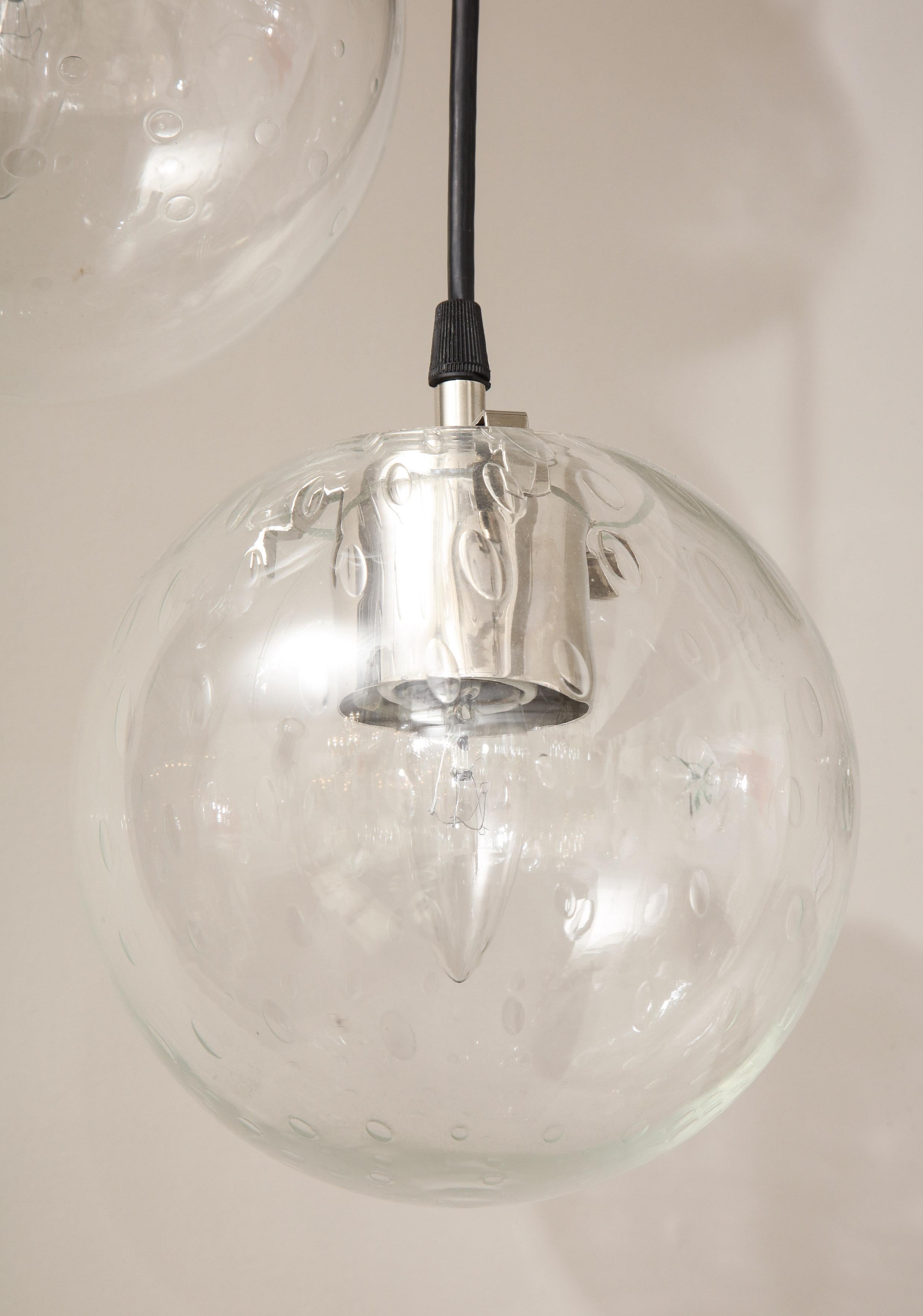 Modern Vintage Limburg Chandelier with 4 Cascading Clear Globe Pendants For Sale