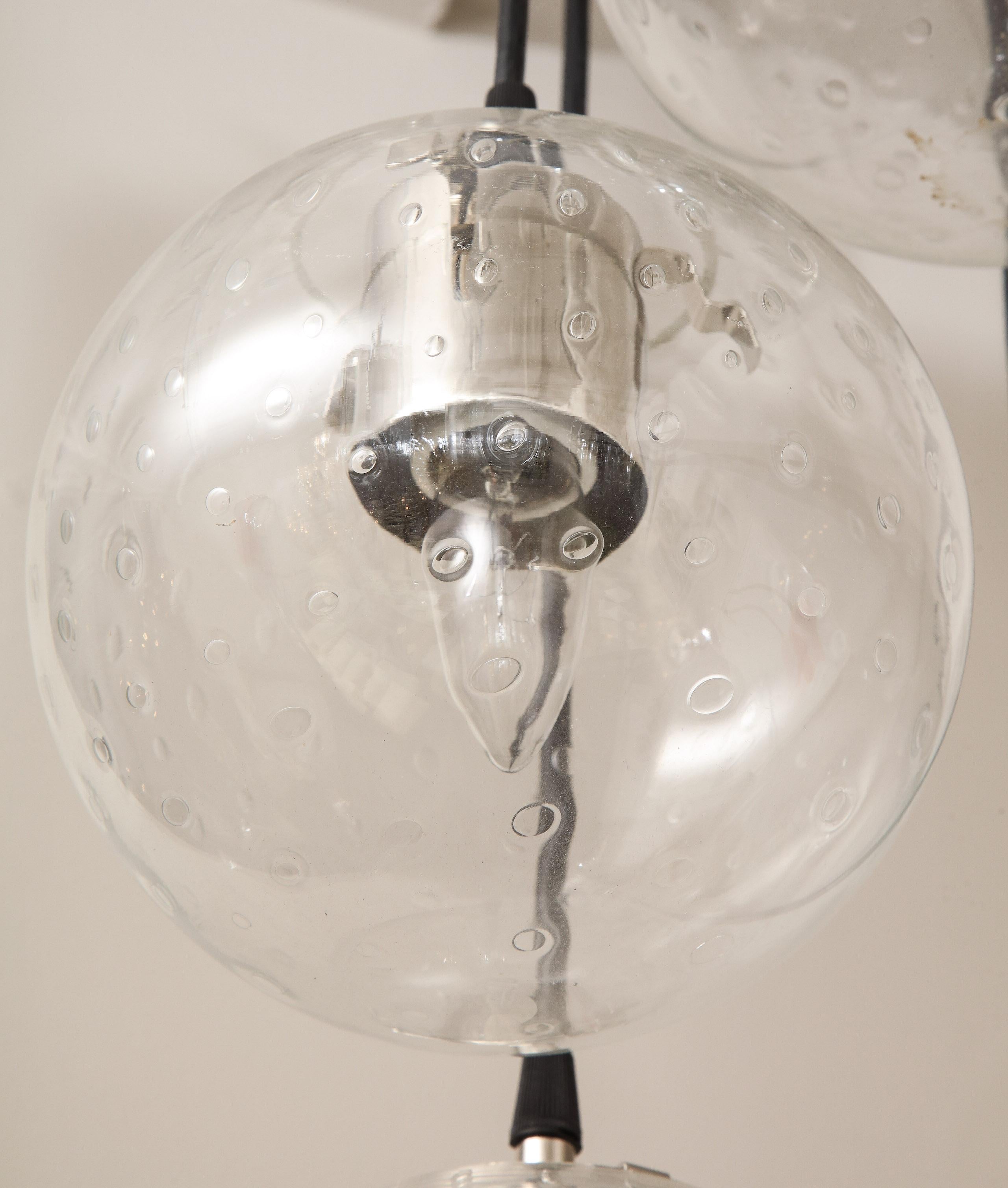 Dutch Vintage Limburg Chandelier with 4 Cascading Clear Globe Pendants For Sale