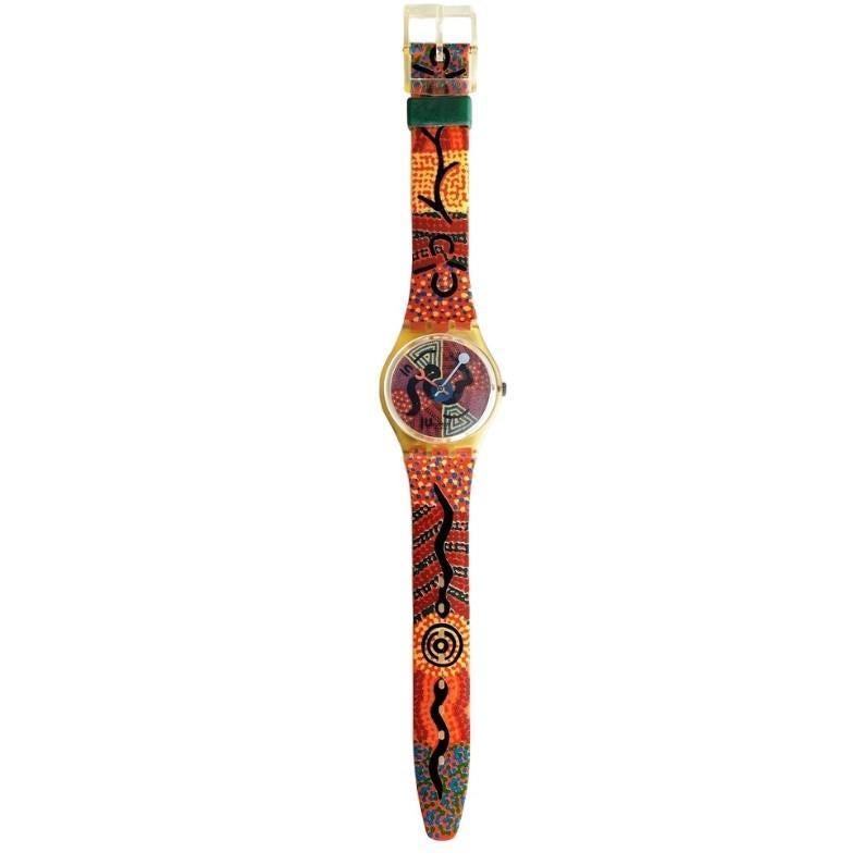 Discover the essence of Australia with this exclusive, unworn vintage Swatch GJ116 from the '90s. Part of the limited Artist Box 1 collection, this watch boasts vibrant signs and colors inspired by the Down Under spirit. With a diameter of 34 mm, it