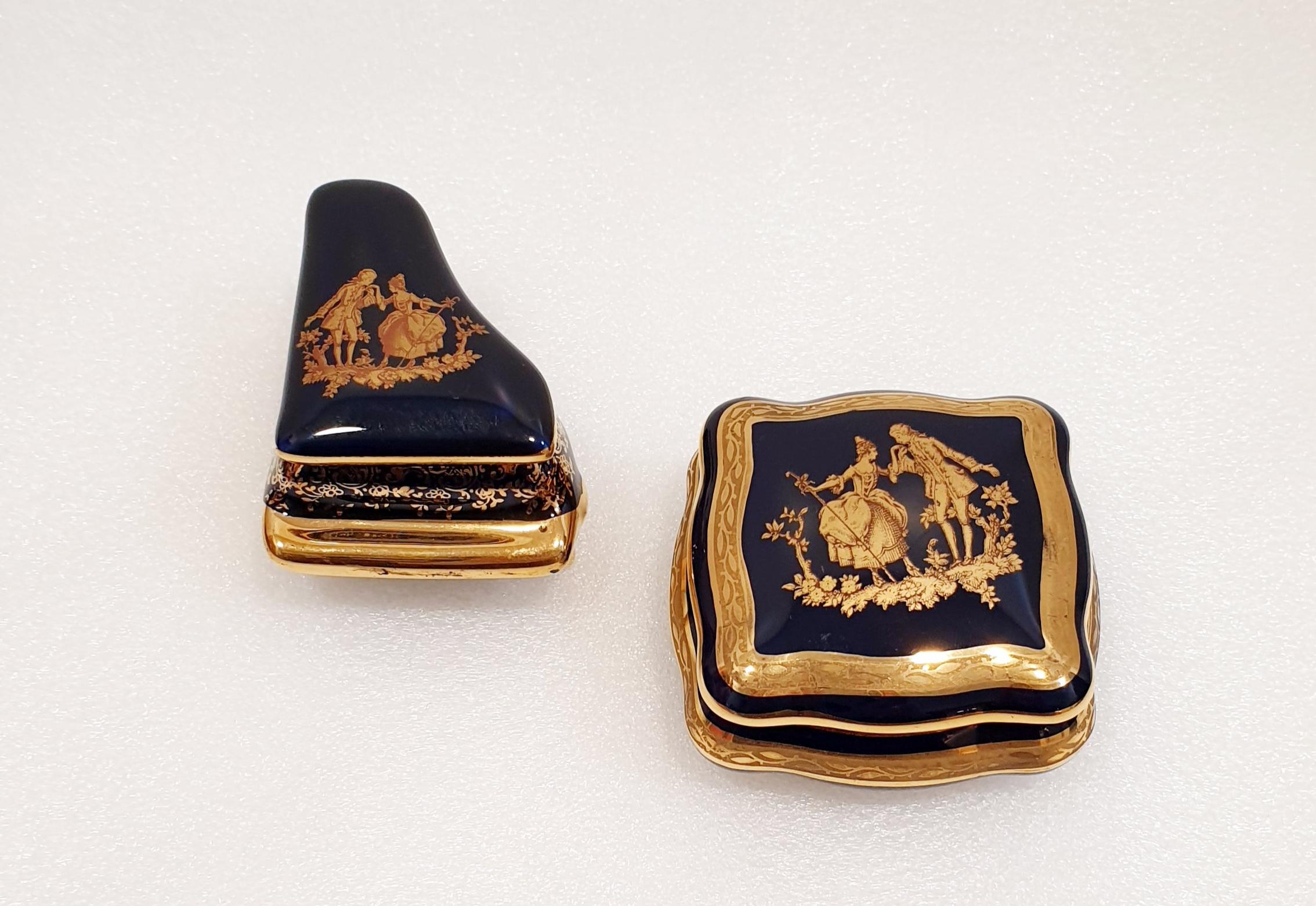 Elegant vintage Limoges 22-karat gold trinket jewelry boxes. 
French vintage Limoges porcelain in cobalt royal blue with fine gold decor.
Marked on base as “Limoges France