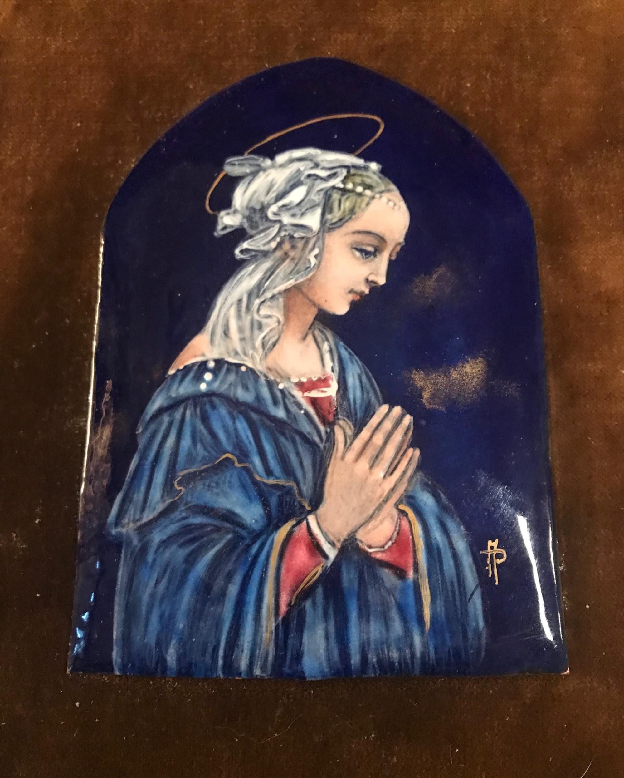 Vintage Limoges painting of The Virgin Mary, enamel on copper.

This serene and beautiful enamel painting is made in Limoges, the French city with a history of great Medieval enamel painting. The plaque is very finely hand painted in enamel on