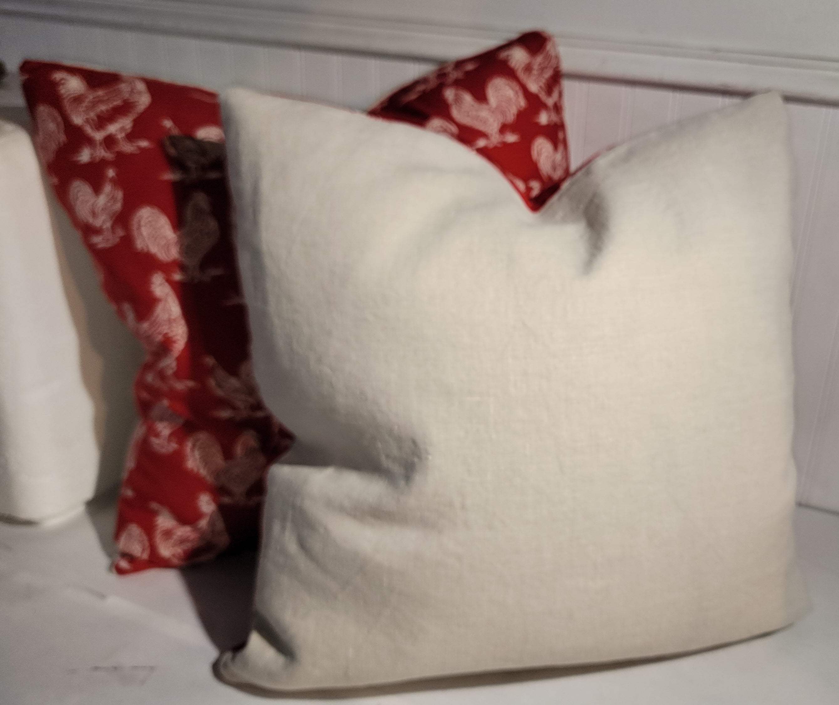This fine roosters printed linen pillows red on cream.The backing is in a white linen backing.The inserts are down & feather fill.
Sold as a pair.