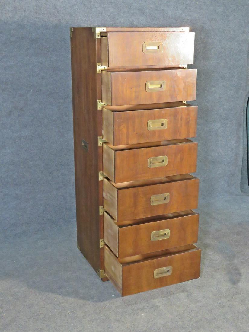 This Mid-Century Modern lingerie chest by Henredon is full of unique vintage style, combining rich woodgrain with metal accents. Seven drawers with dovetailed construction offer plenty of storage in a sturdy design. Please confirm item location with