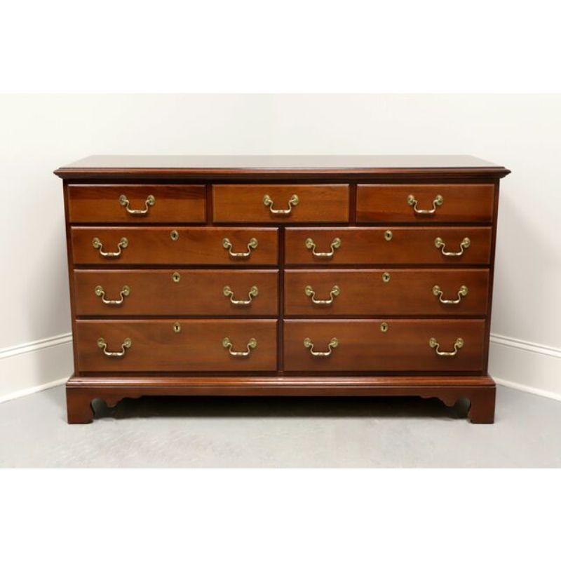 A Chippendale style double dresser by Link-Taylor. Mahogany with brass hardware and bracket feet. Features nine drawers of dovetail construction, six with faux lock plates. Made in Lexington, North Carolina, USA, circa 1985.

Measures: 57 W 19.5 D