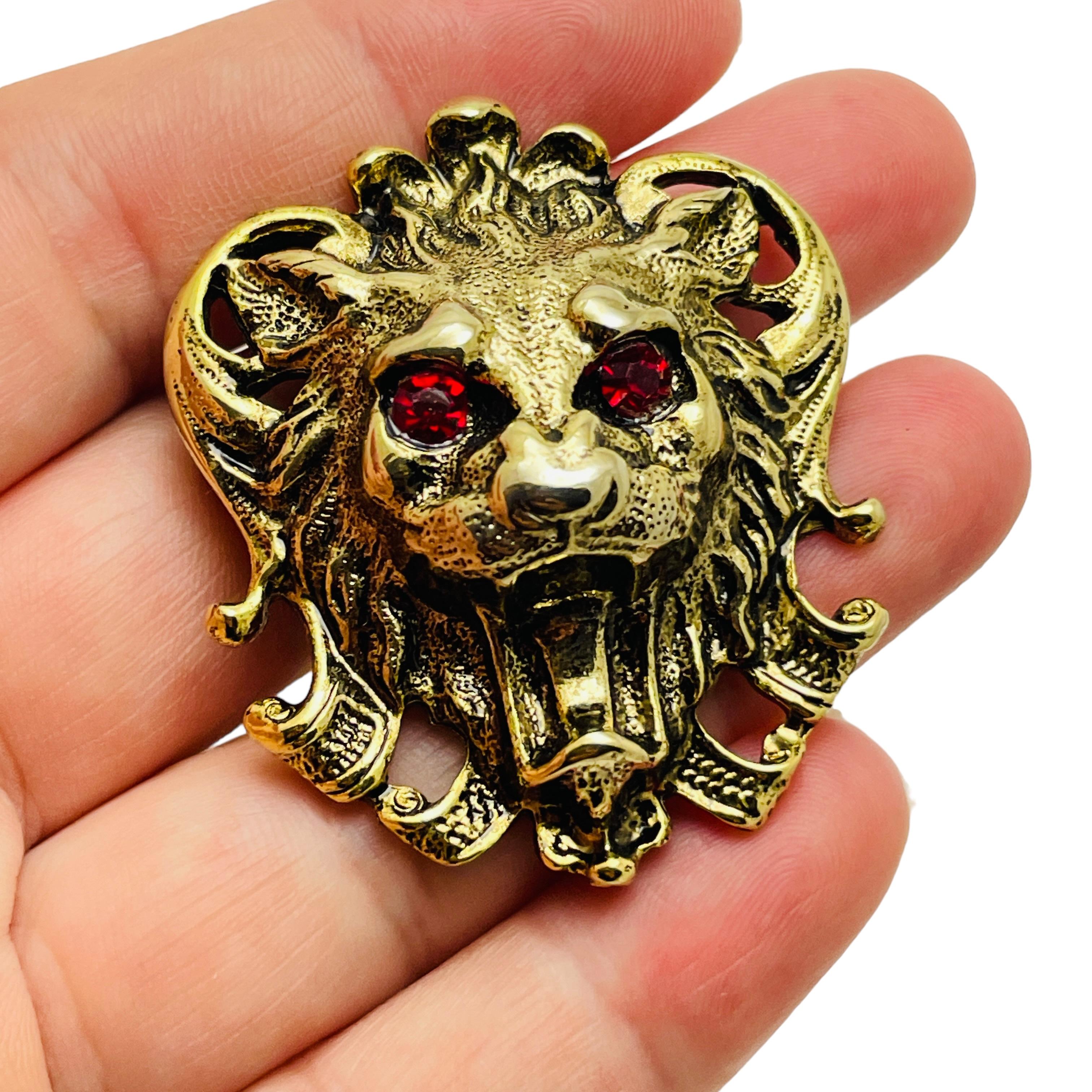 Women's Vintage lion gold tone ruby red eyes designer brooch For Sale