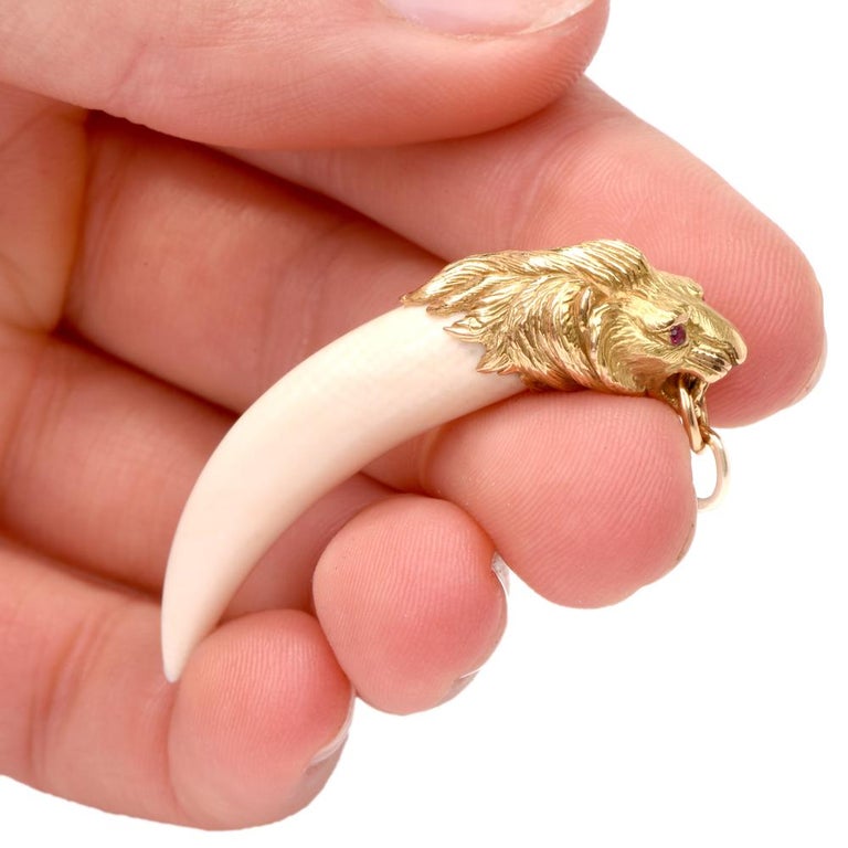 Vintage Lion Head Tooth Bone 18 Karat Gold Pendant at 1stDibs real