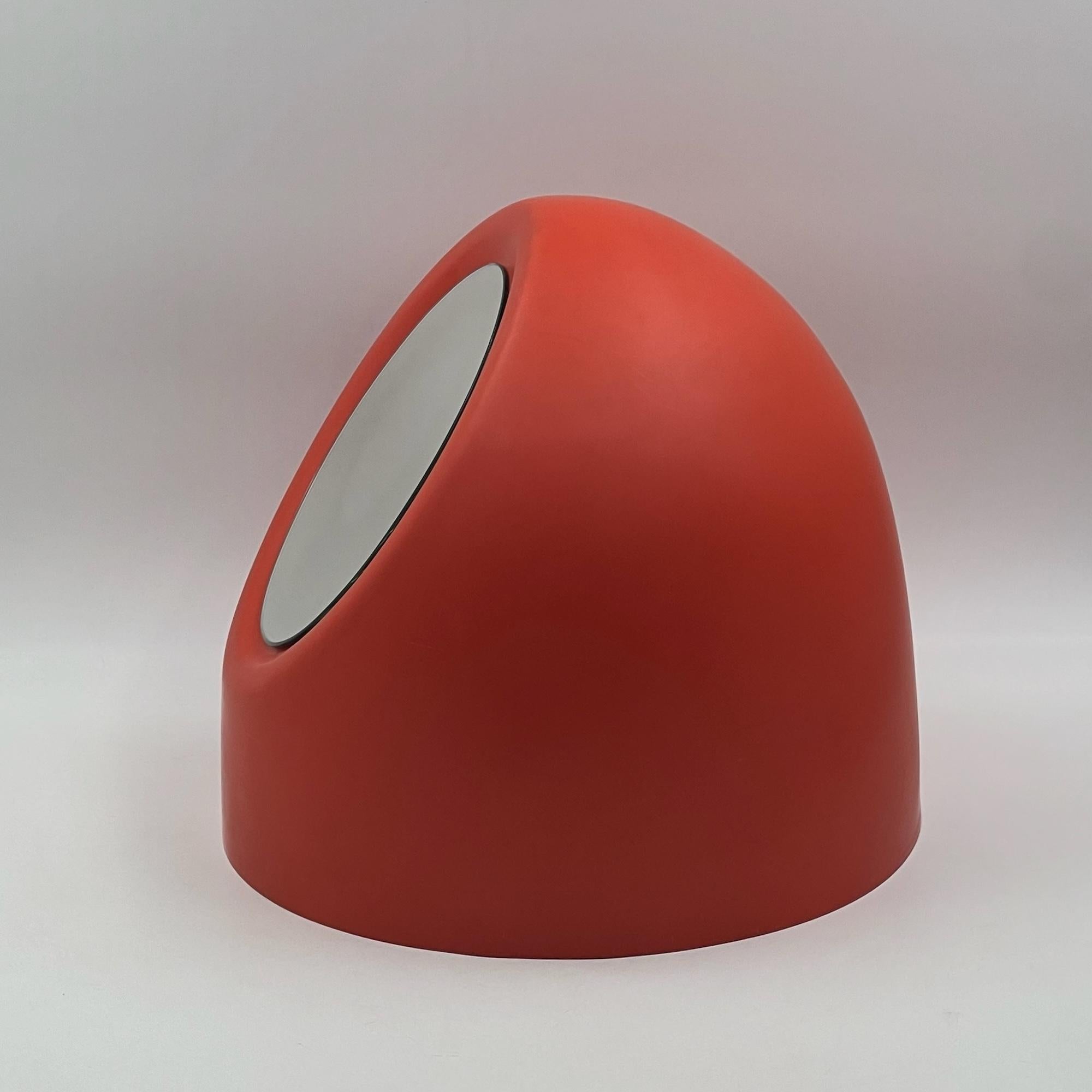 Discover this rare and amazing vintage lipstick table mirror, crafted by Cassina in the 60s, with a distinctive egg-shaped design. This rare find evokes the style of the famous Lipstick mirror by Rodolfo Bonetto, but with softer, more rounded